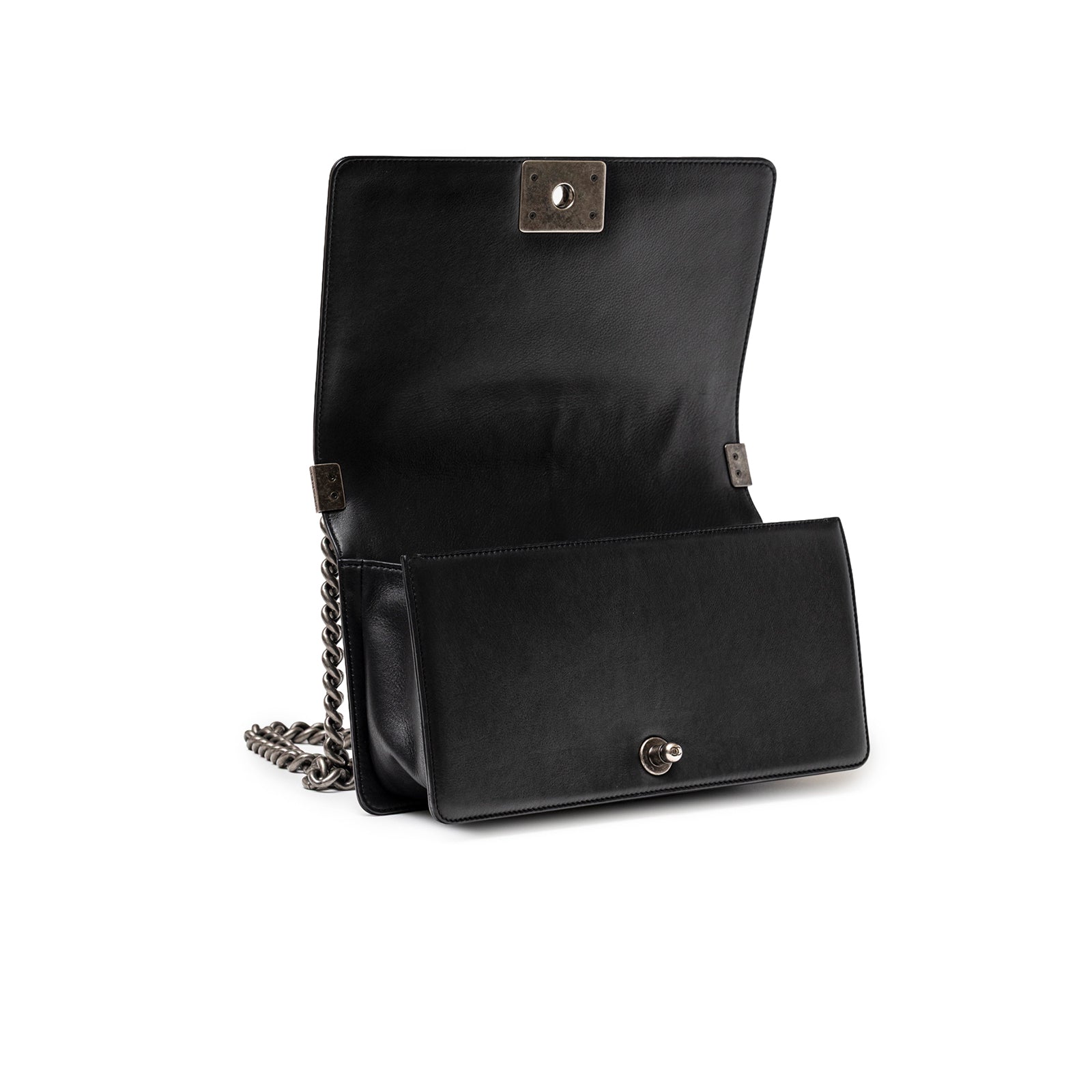 Open view of Chanel Boy Bag Medium Black Lambskin Ruthenium Hardware showing interior and chain strap detail