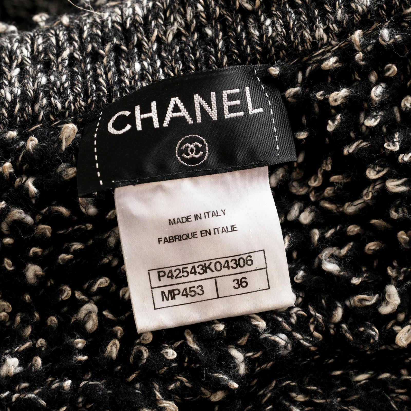 Close-up of Chanel Cardigan Long Black/White label showing brand tag and size 36 made in Italy details