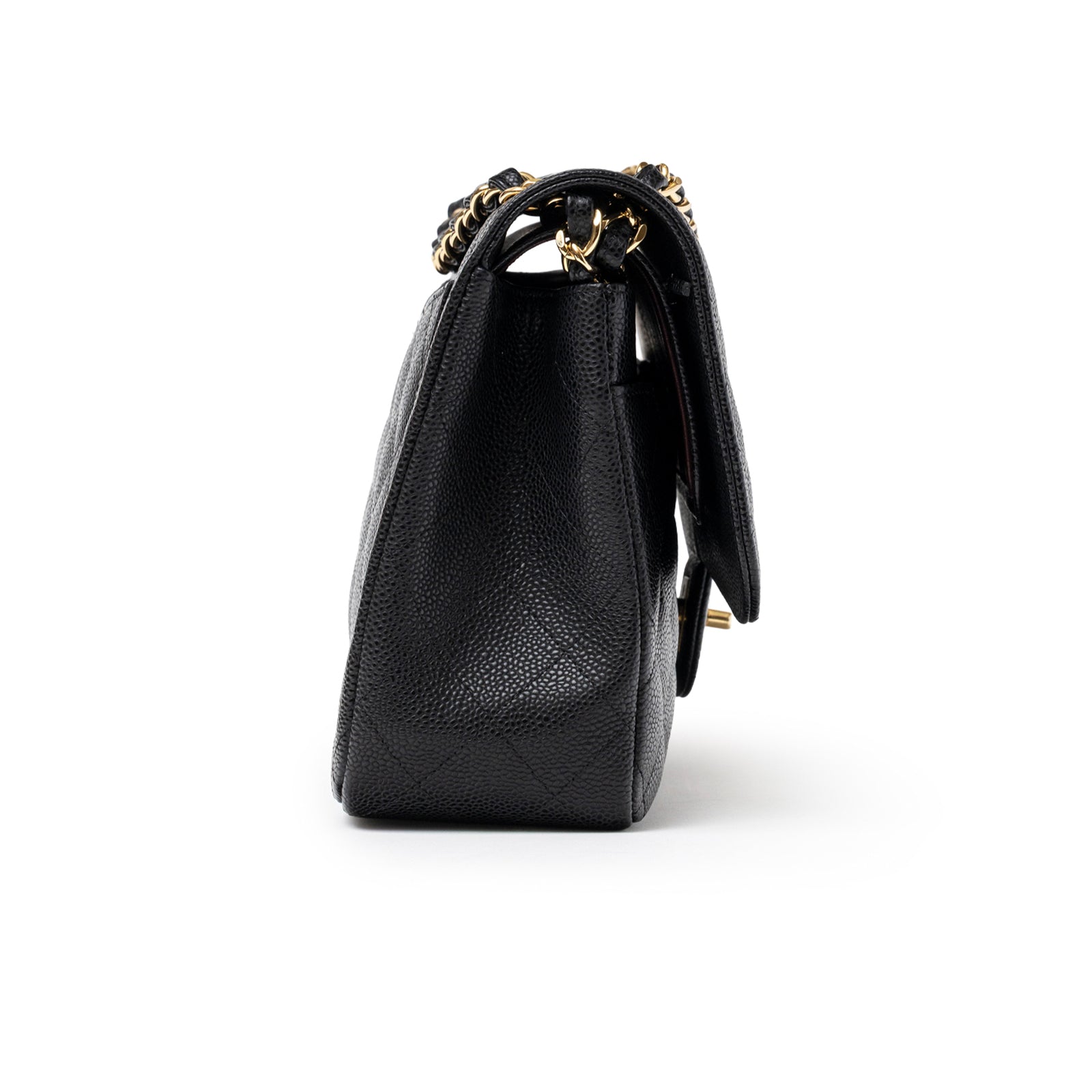 Side profile of Chanel Classic Flap Jumbo Caviar Black Gold Hardware showcasing textured leather and chain strap details