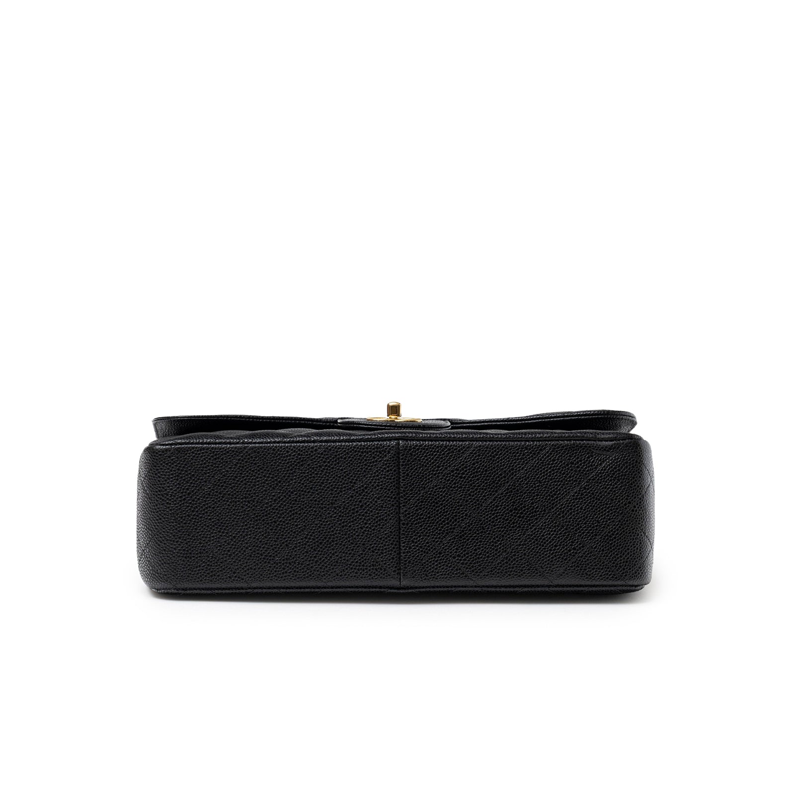 Bottom view of Chanel Classic Flap Jumbo Caviar Black Gold Hardware showing textured leather base and stitching detail