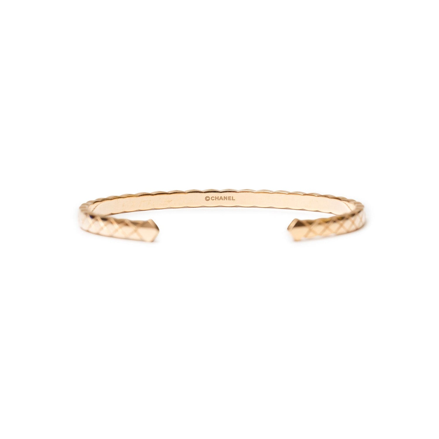 Front view of Chanel Coco Crush Mini Bracelet 18K Gold Au750 with quilted pattern and open cuff design
