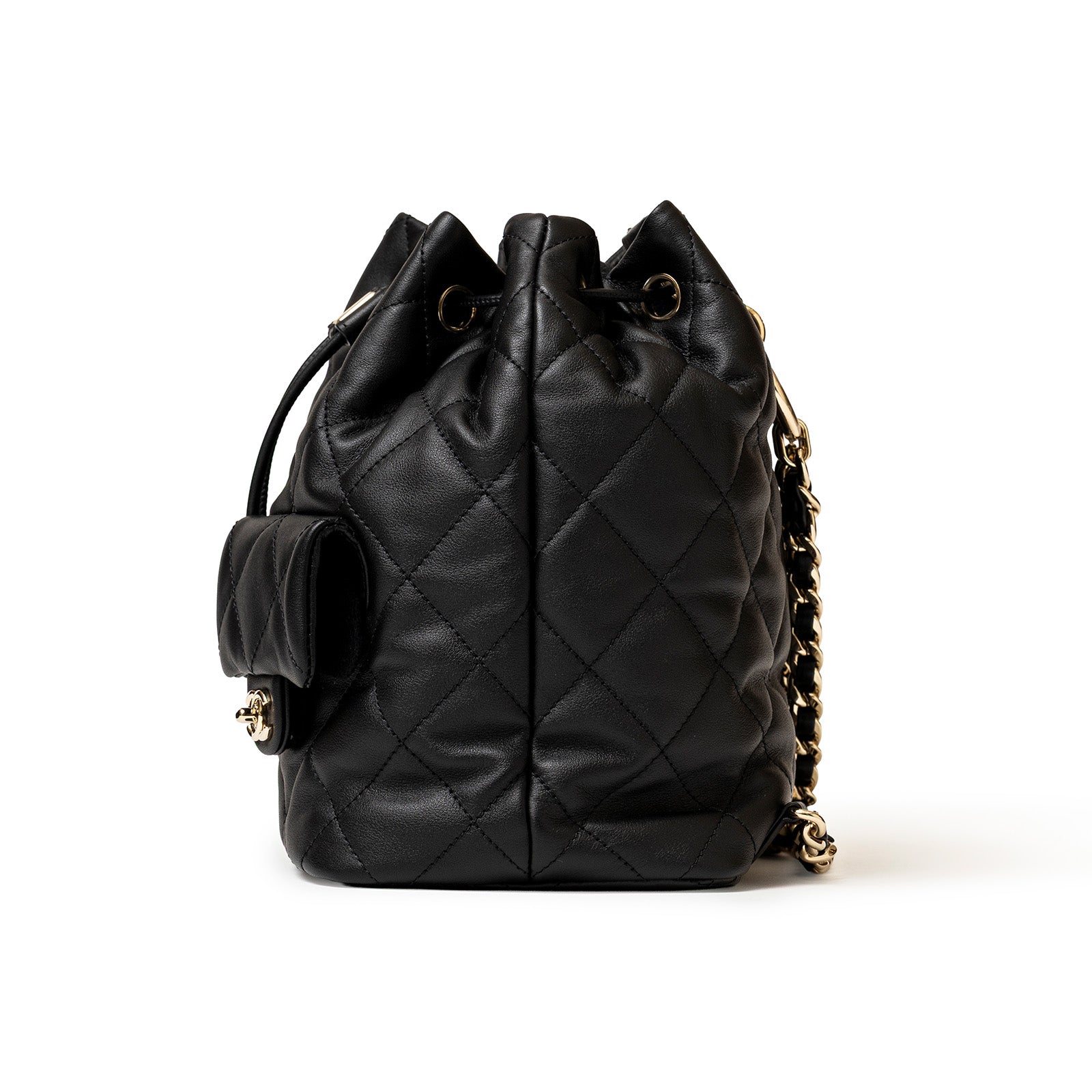 Black quilted leather bucket bag showcases Coco Mellow Backpack Calf Black hardware