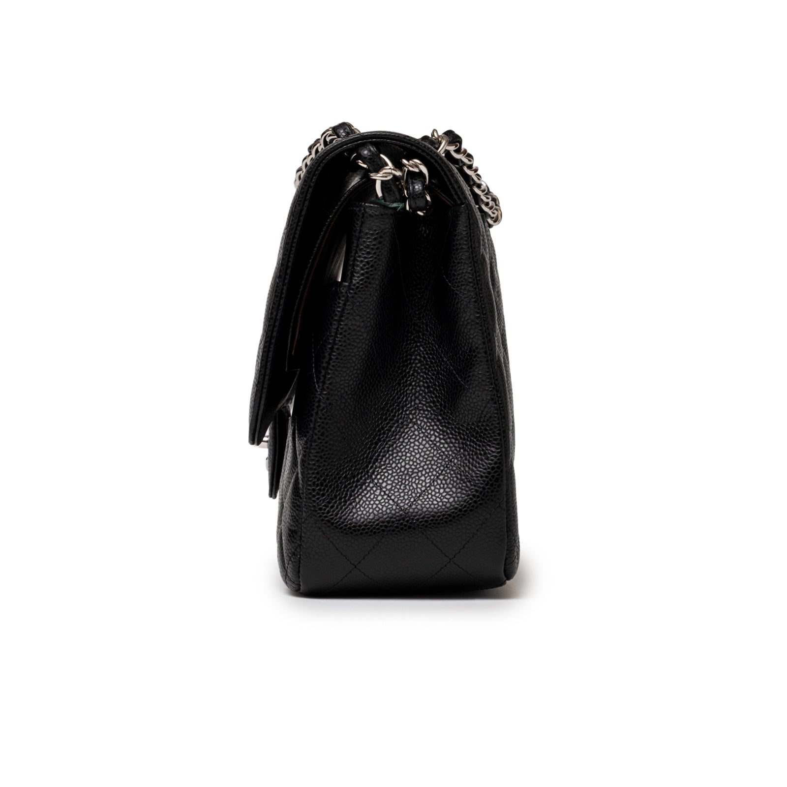 Side profile of Chanel Jumbo Classic Double Flap Caviar Black Palladium Hardware showing pebbled leather texture