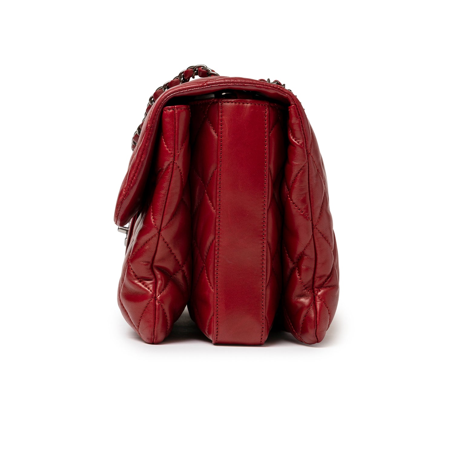 Side view of Chanel Maxi 3 Accordion Flap Bag Lambskin Red Palladium Hardware showing quilted leather compartments