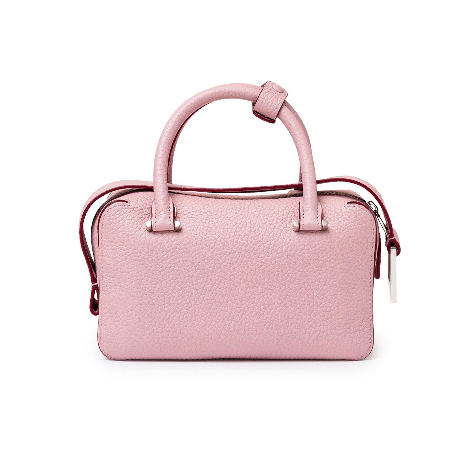 Back view of Delvaux Cool Box Mini Taurillon Soft Blush Palladium Hardware shown from back with soft pink textured leather and handles