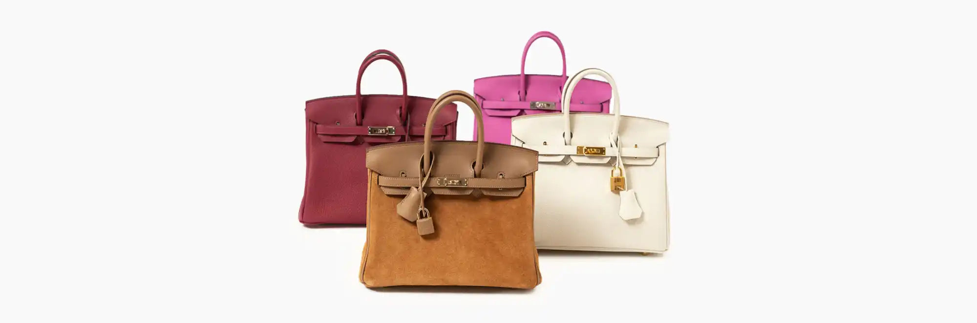 Four luxury handbags.