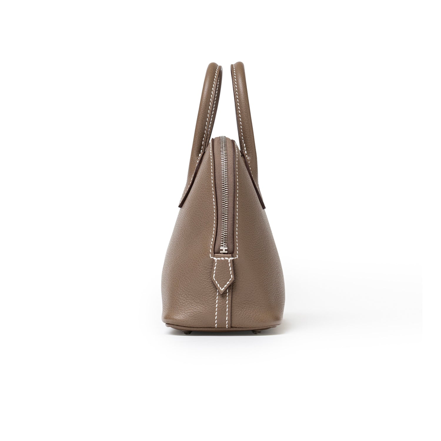 Side view of Hermès 1923 Bolide Mini Etoupe Evercolor Palladium Hardware showing zipper and stitching details