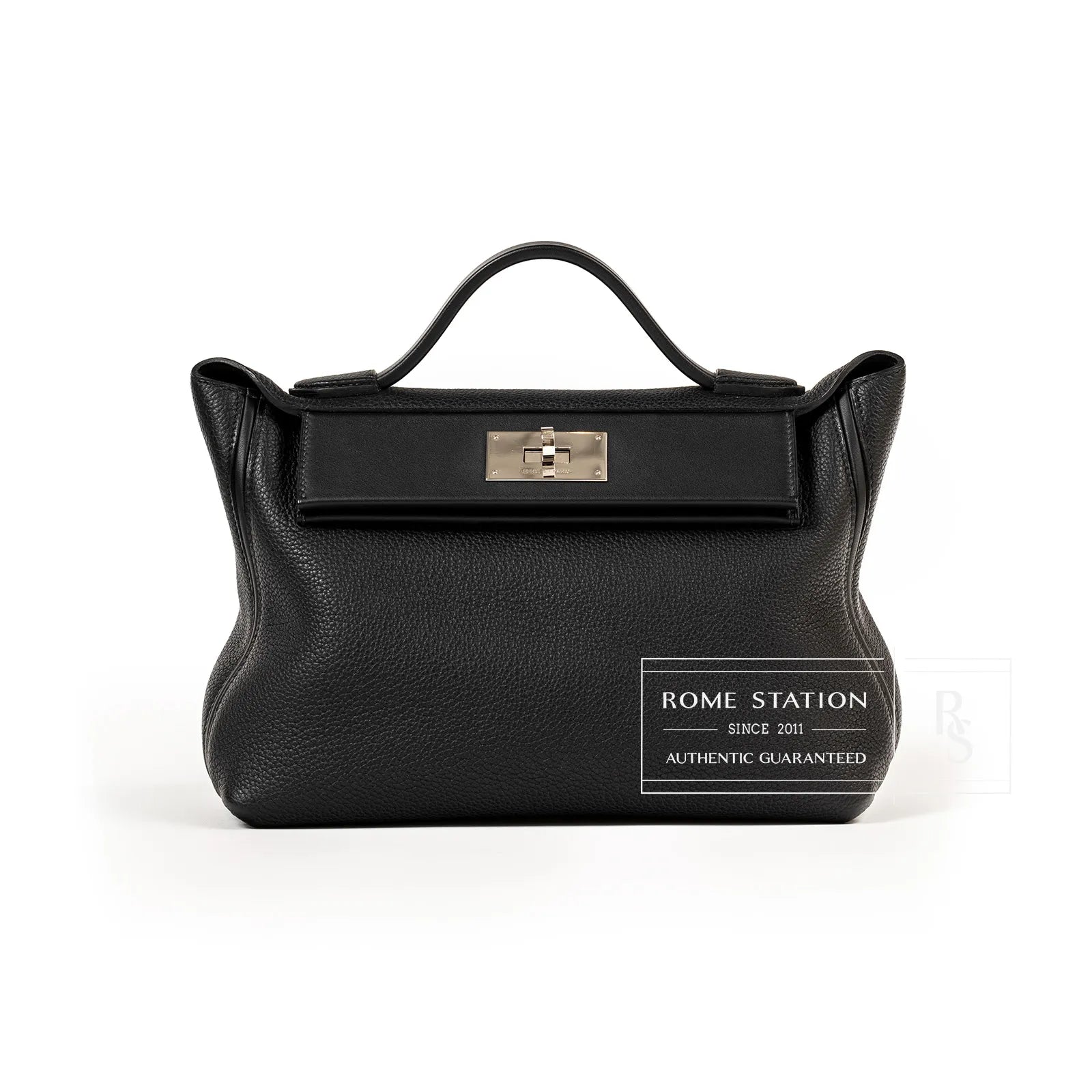Front view of Hermès 24/24 29 black Taurillon Maurice leather bag with palladium clasp hardware.