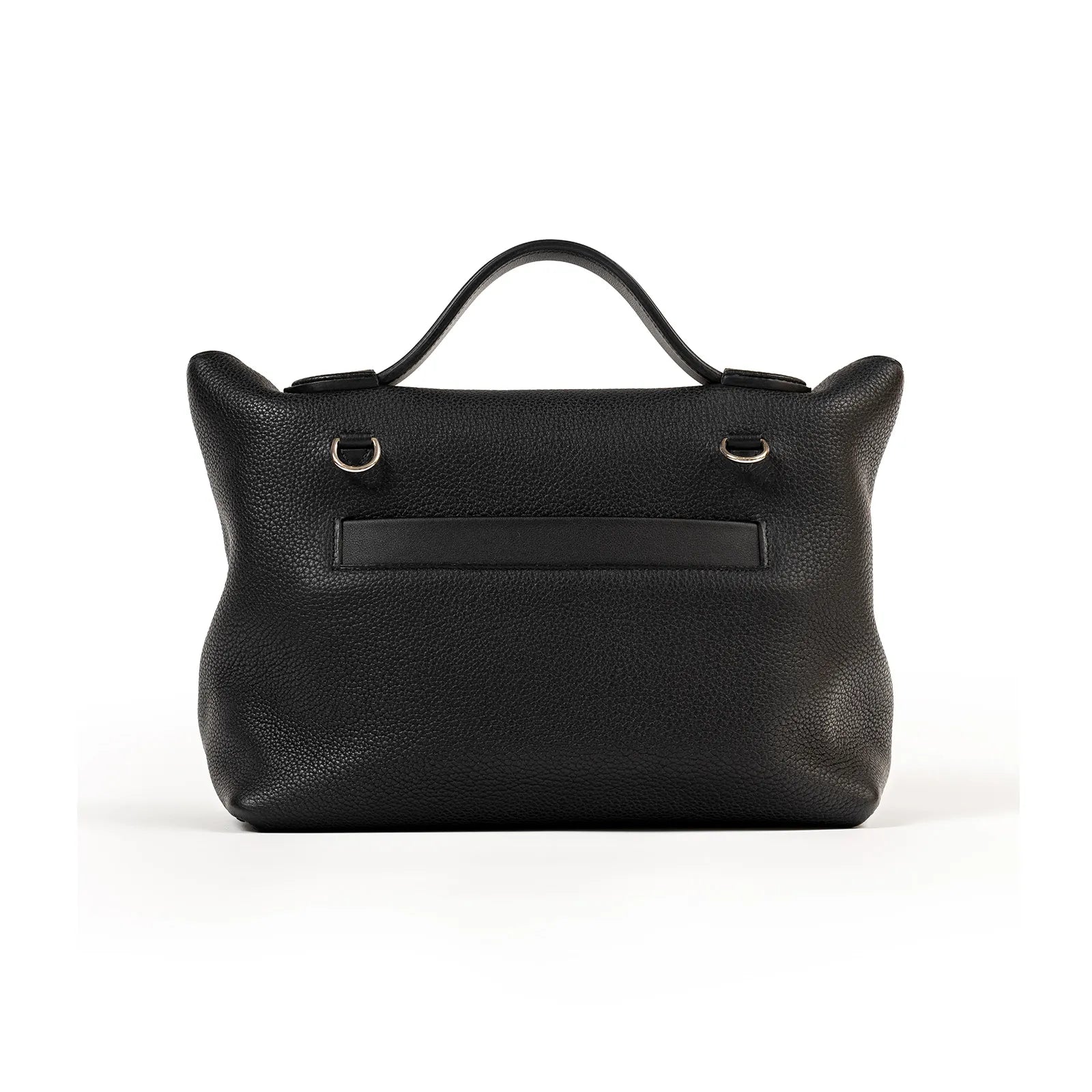 Back view of black textured leather sac bag with single handle and palladium hardware rings visible