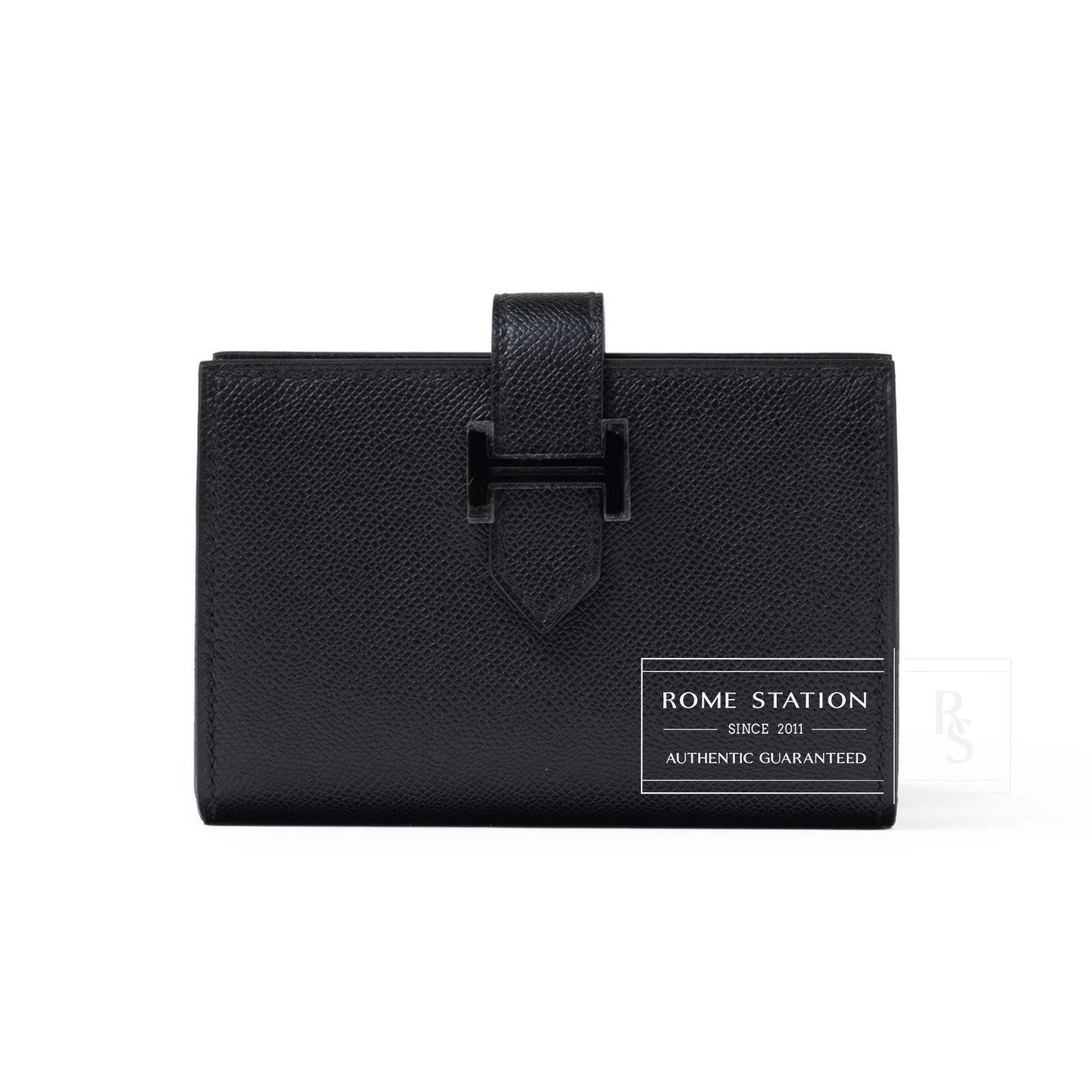 Front view of Hermès Bearn Mini Wallet Monochrome Madame So Black with textured leather and strap closure