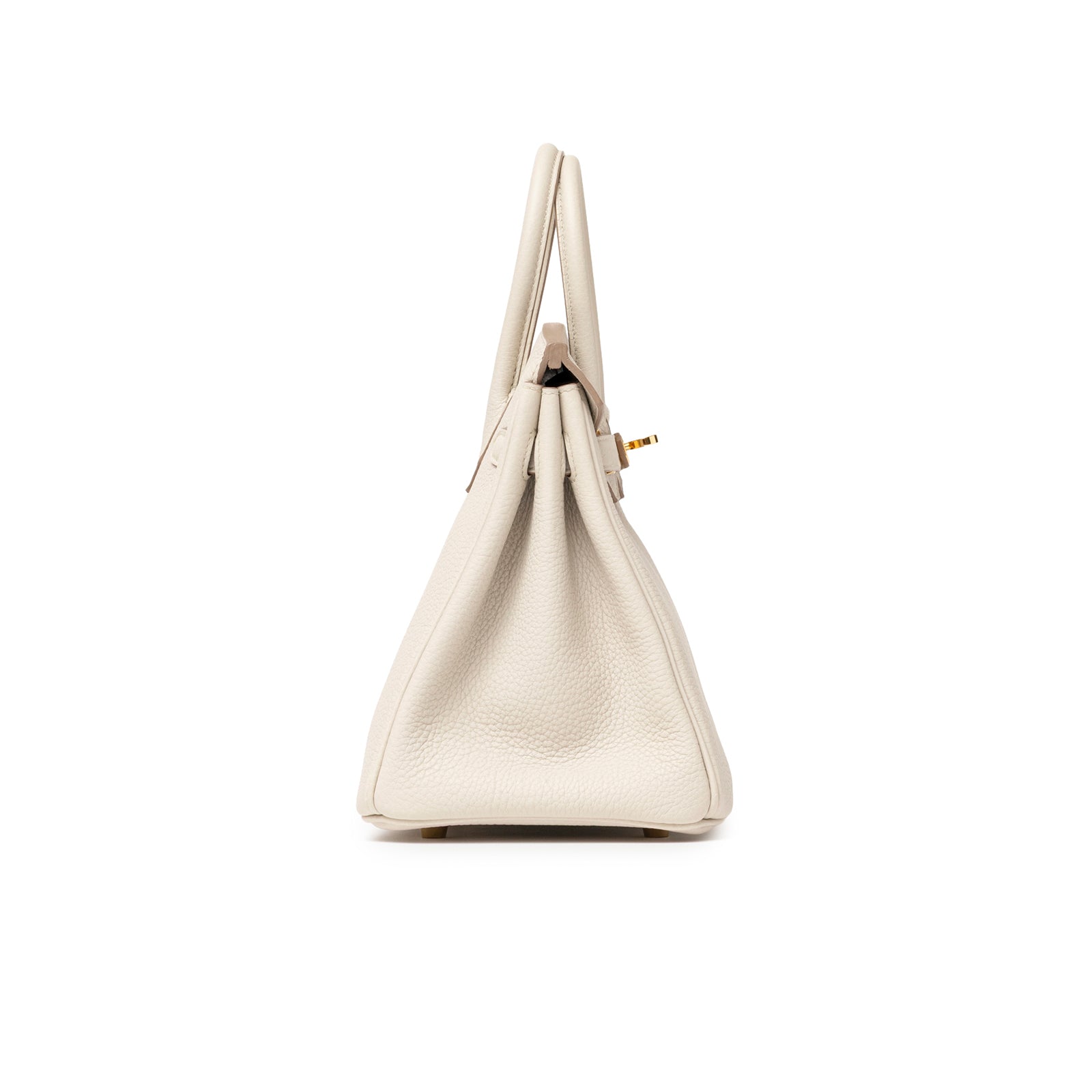 Side profile of Hermès Birkin 25 Beton Togo Gold Hardware highlighting textured leather and structured silhouette