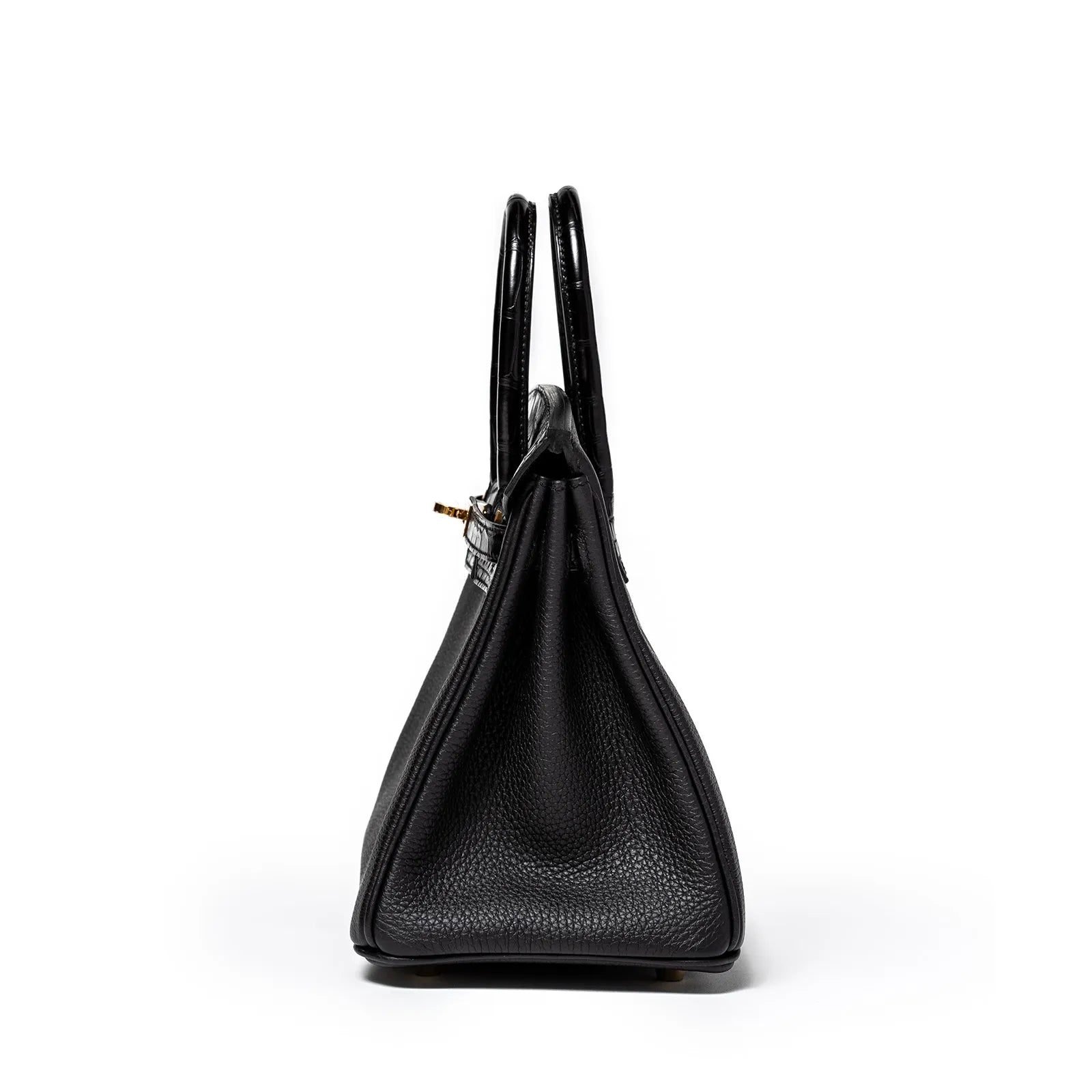 Side view of Hermès Birkin 25 in black Togo leather with matte alligator handles and gold hardware details