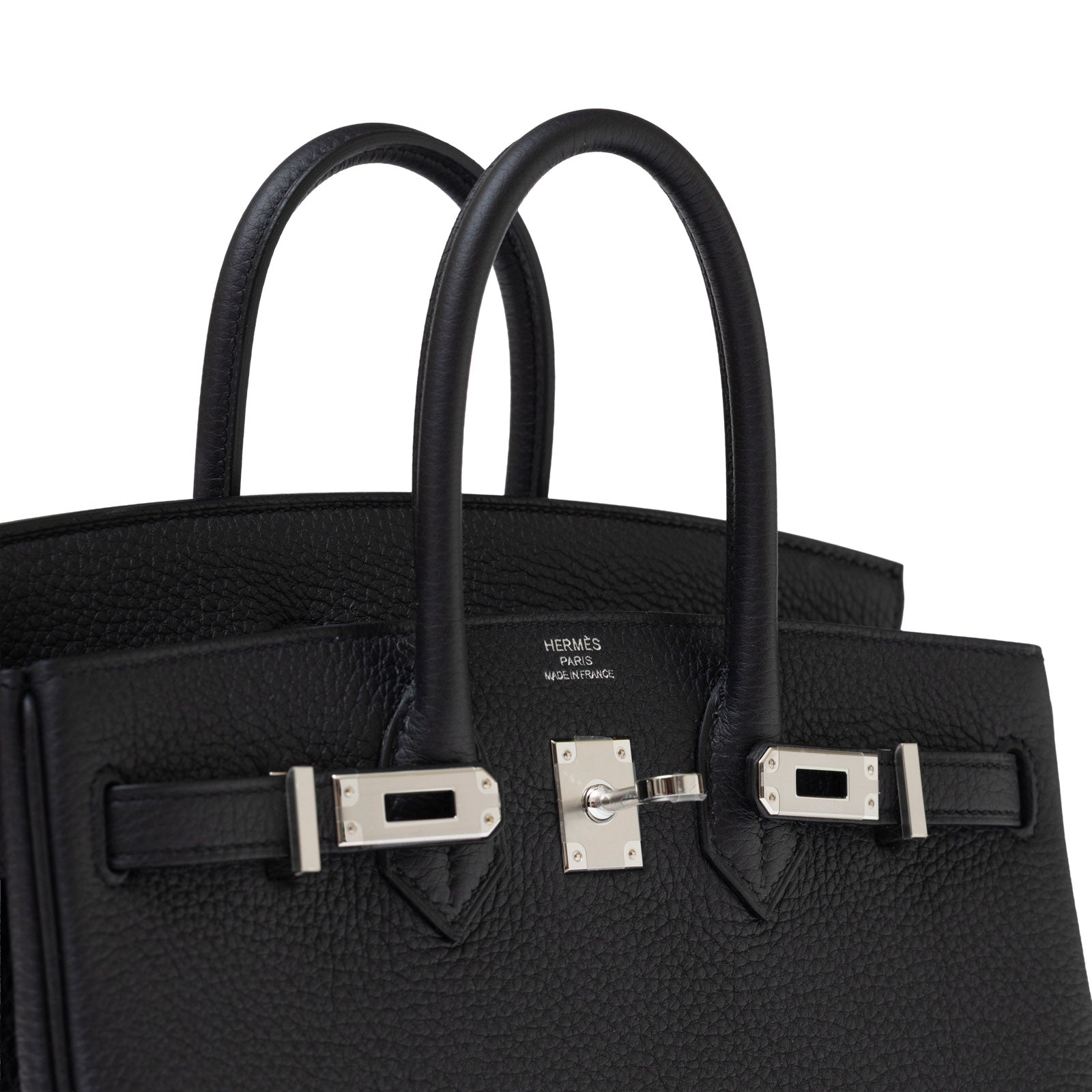Close-up angled view of Hermès Birkin 25 Black Togo Palladium Hardware showing grain texture and clasp details