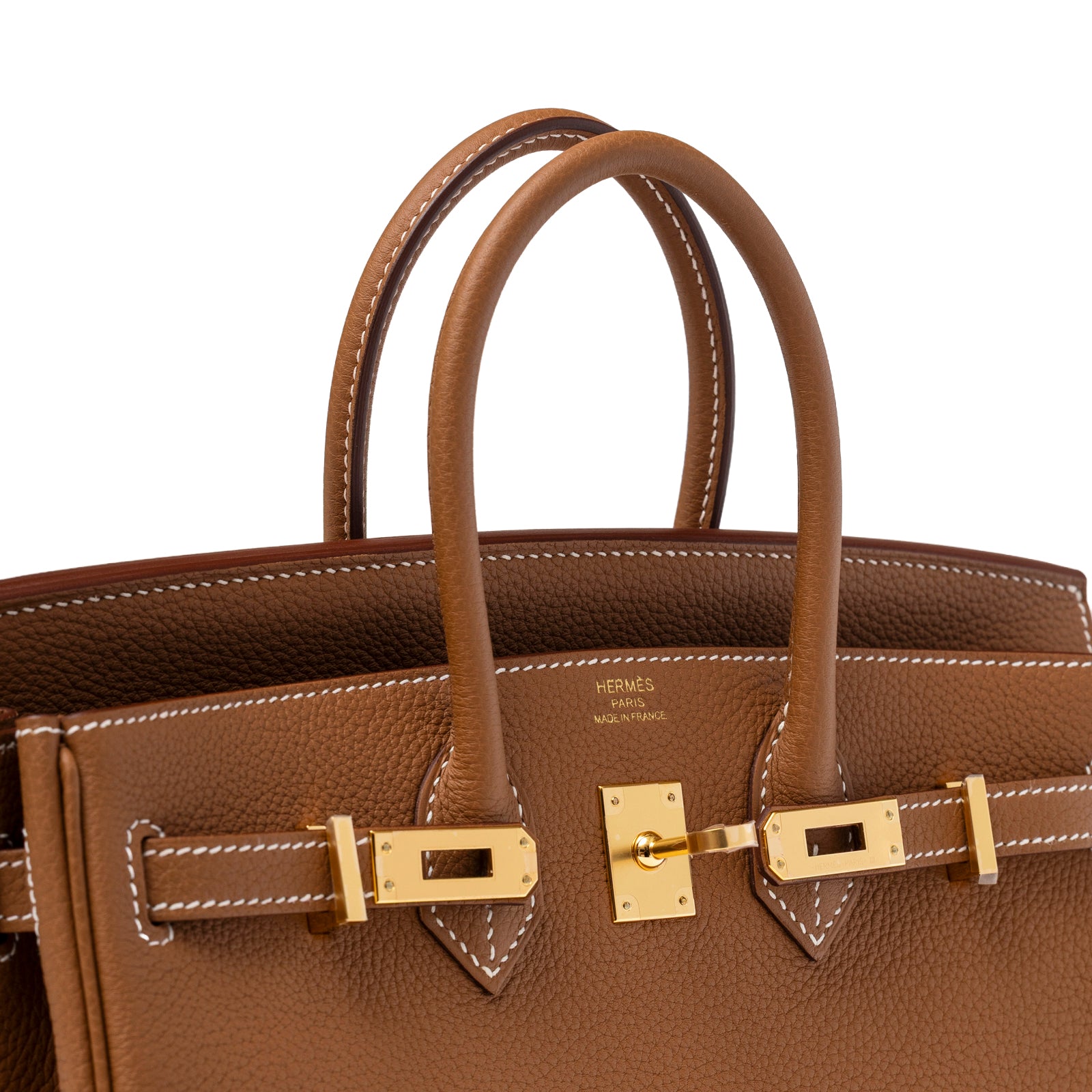 Close-up of Hermès Birkin 25 Gold Togo Gold Hardware showing gold lock and textured brown leather handles