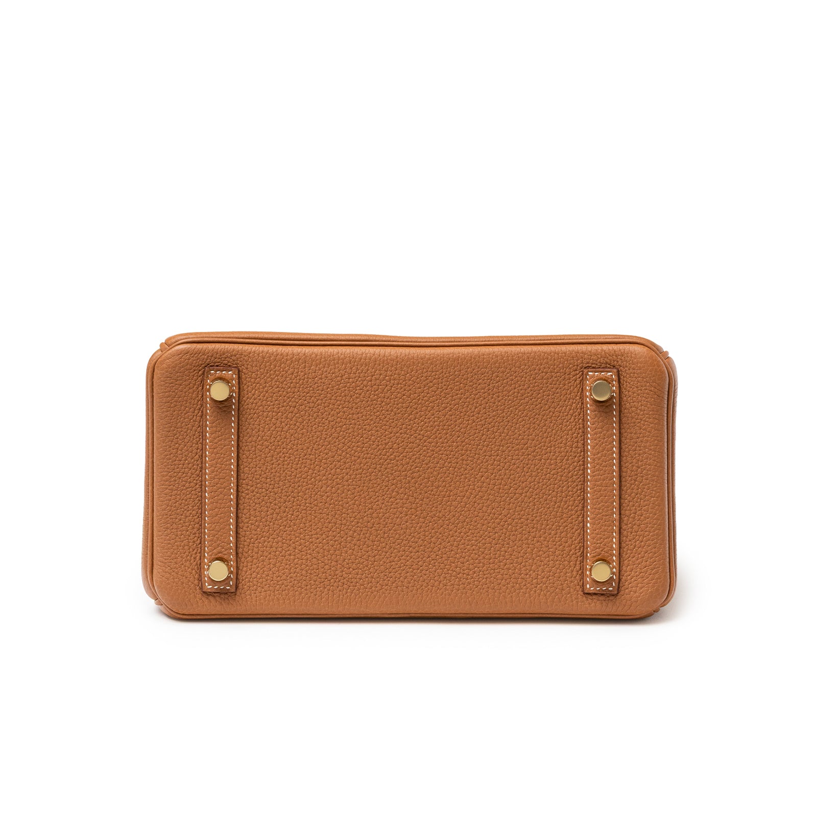 Bottom view of Hermès Birkin 25 Gold Togo Gold Hardware showing leather texture and protective feet details.