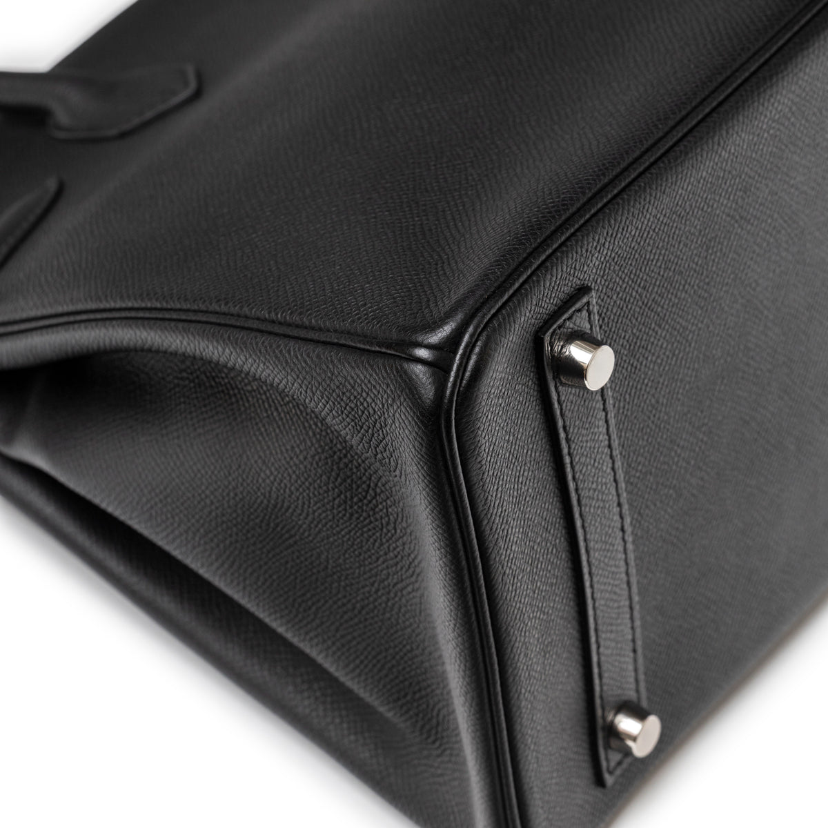 Close-up of the base and protective feet on Hermès Birkin 30 Black Epsom Palladium Hardware handbag
