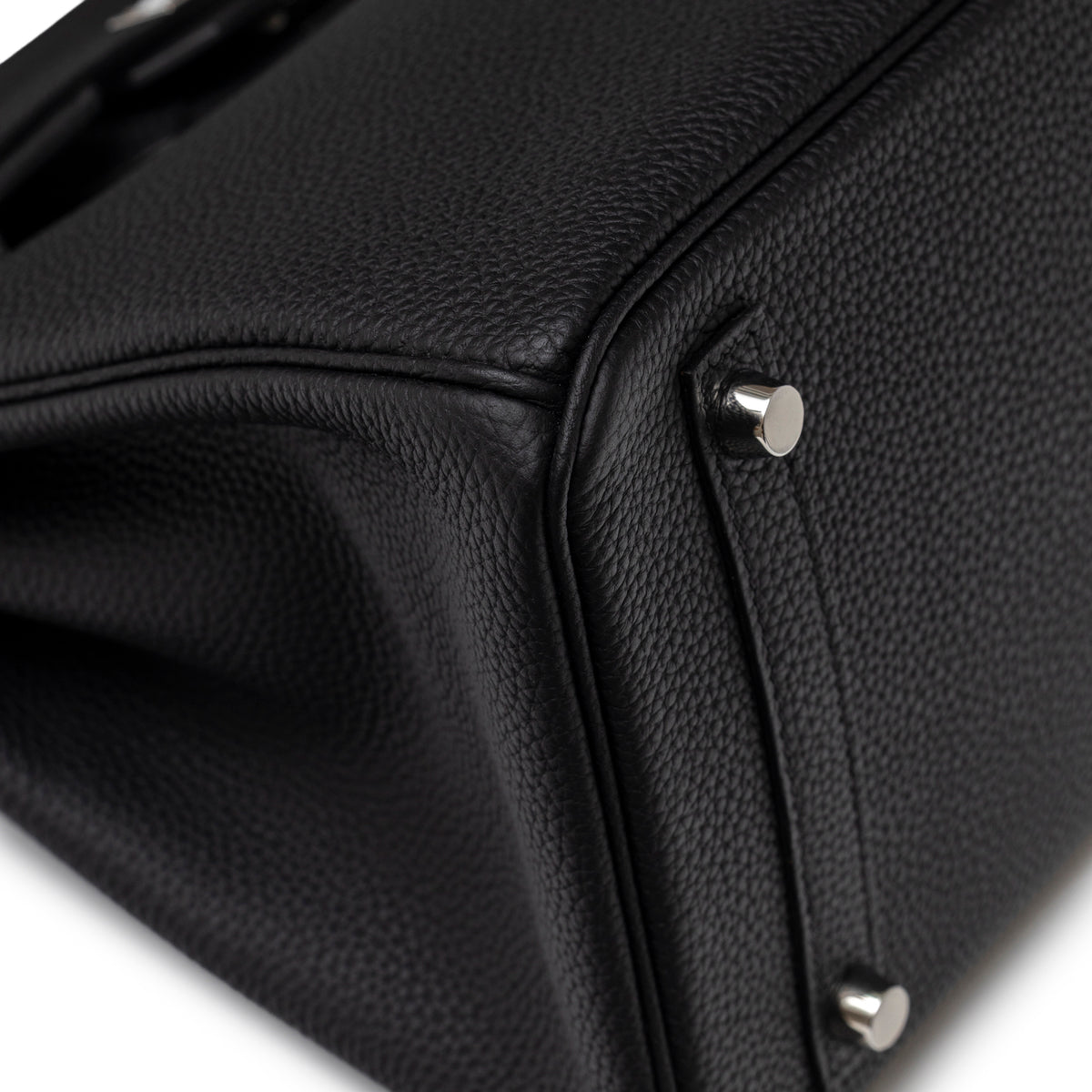 Close-up of bottom corner and palladium feet on Hermès Birkin 30 Black Togo Palladium Hardware handbag