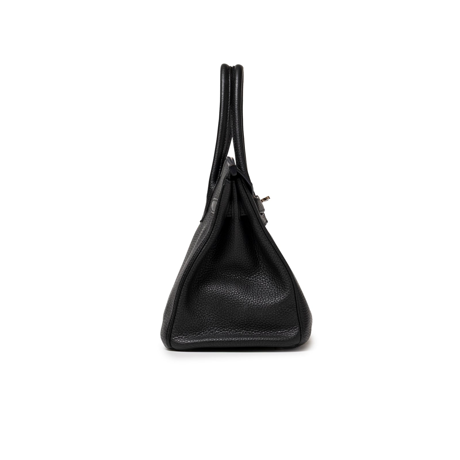 Side profile of Hermès Birkin 30 Black Togo Palladium Hardware showing textured leather and handles upright.