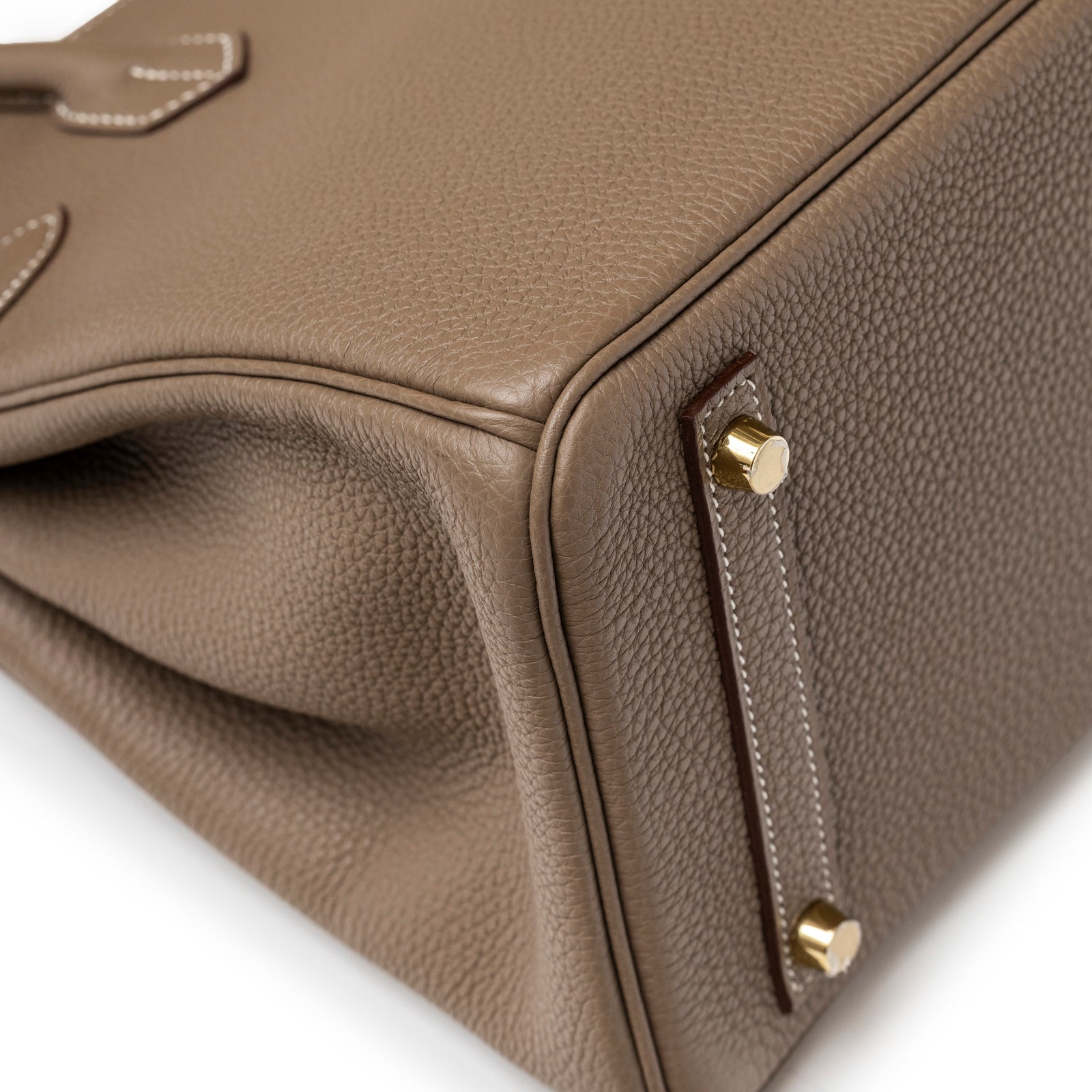 Hermès Birkin 30 Etoupe Togo Gold Hardware corner close-up with protective feet and textured leather