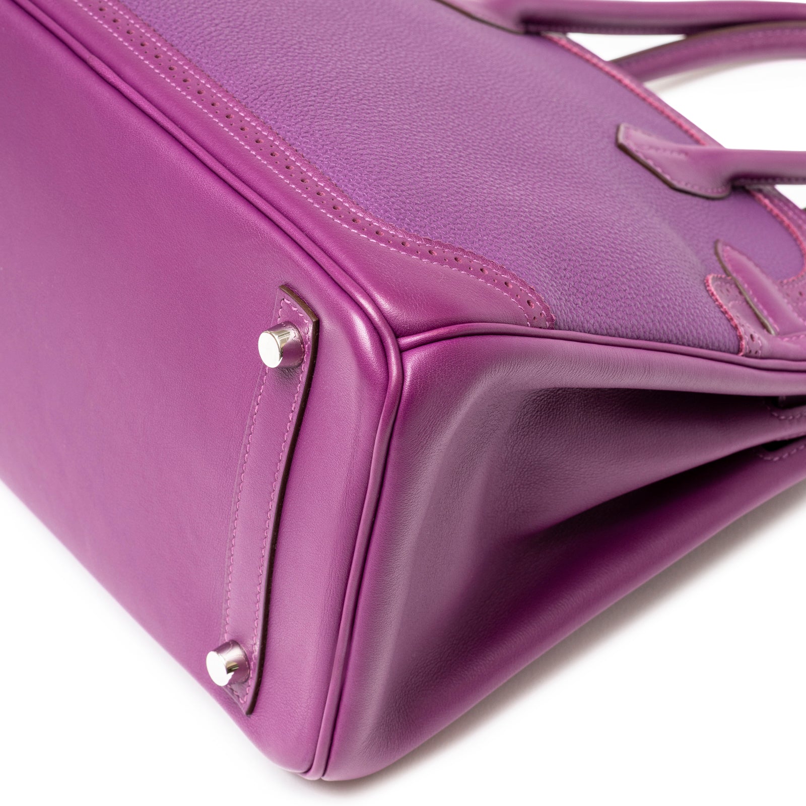 Close-up angled view of Hermès Birkin 30 Ghillies Anemone Togo Swift Palladium Hardware corner showing polished details
