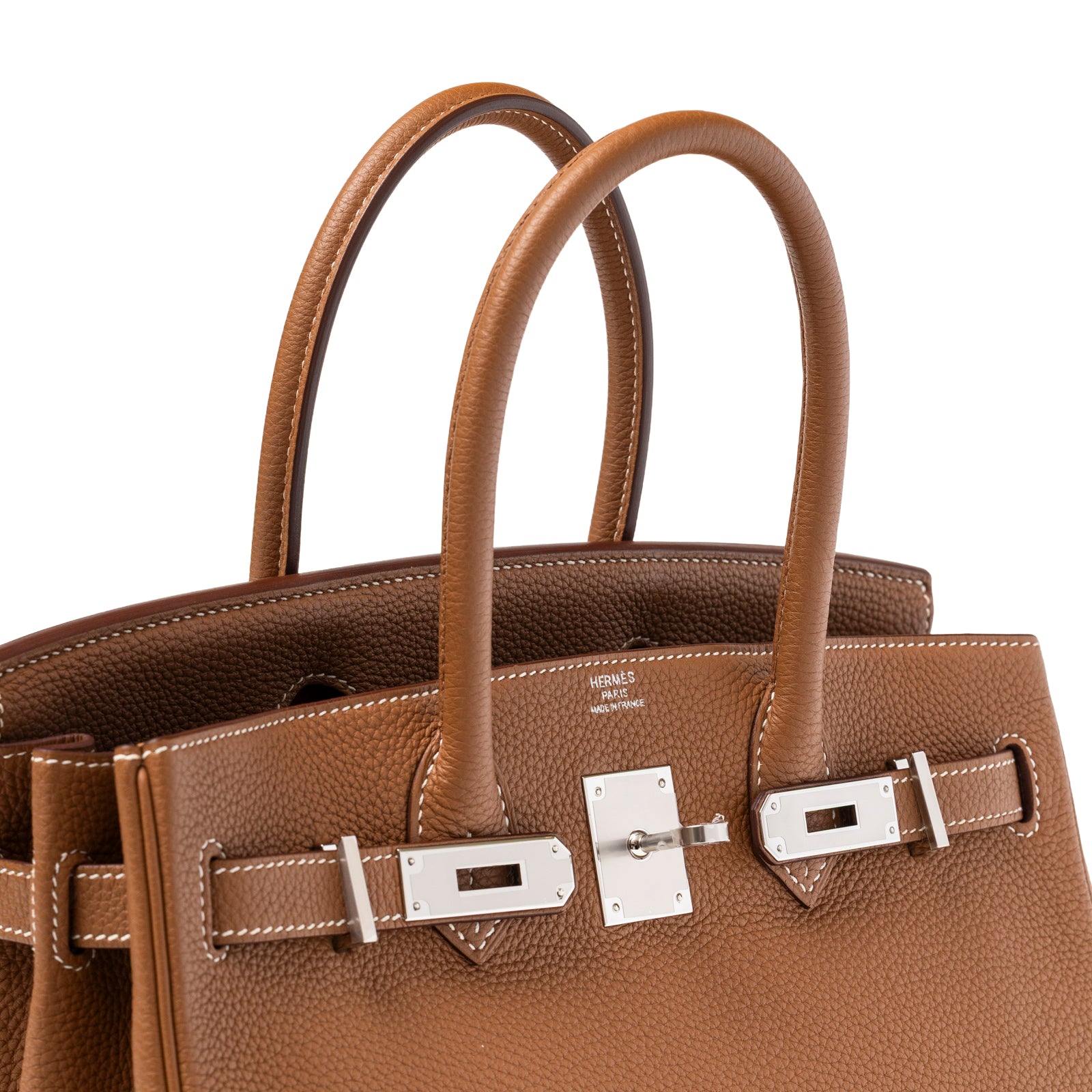 Close-up angled view of Hermès Birkin 30 Gold Togo Palladium Hardware showing handles and clasp details