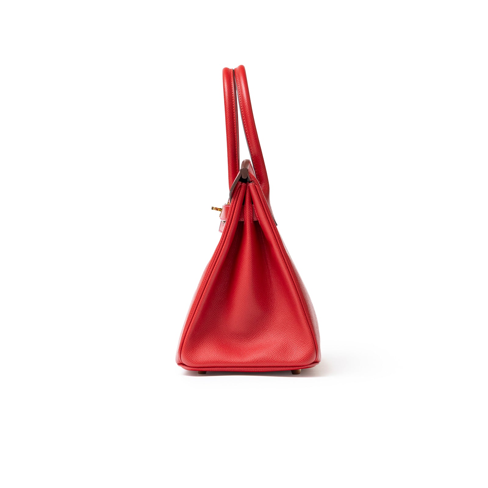 Side profile of Hermès Birkin 30 Rouge Casaque Epsom Gold Hardware showcasing its structured silhouette and smooth leather texture