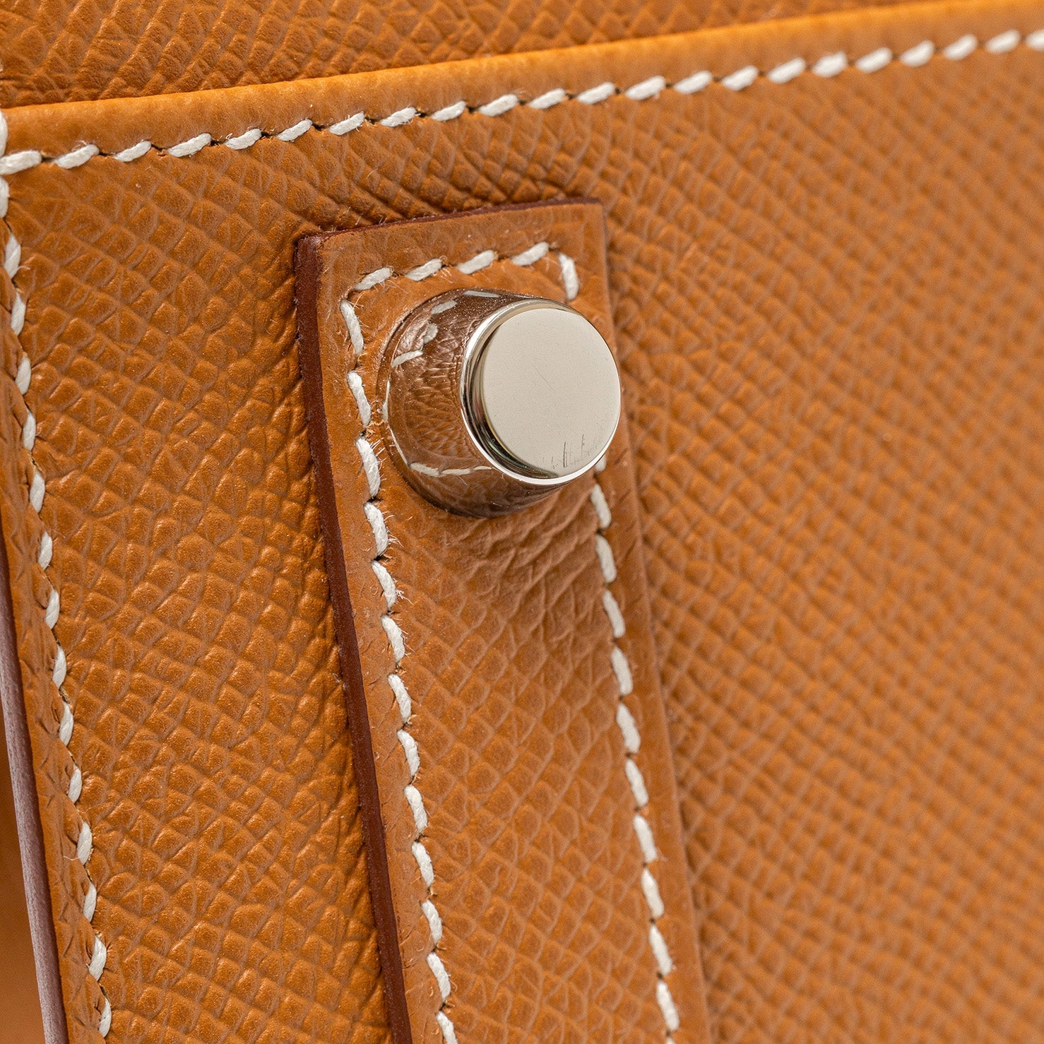 Close-up of feet on Hermès Birkin 30 Sellier Gold Epsom Palladium Hardware