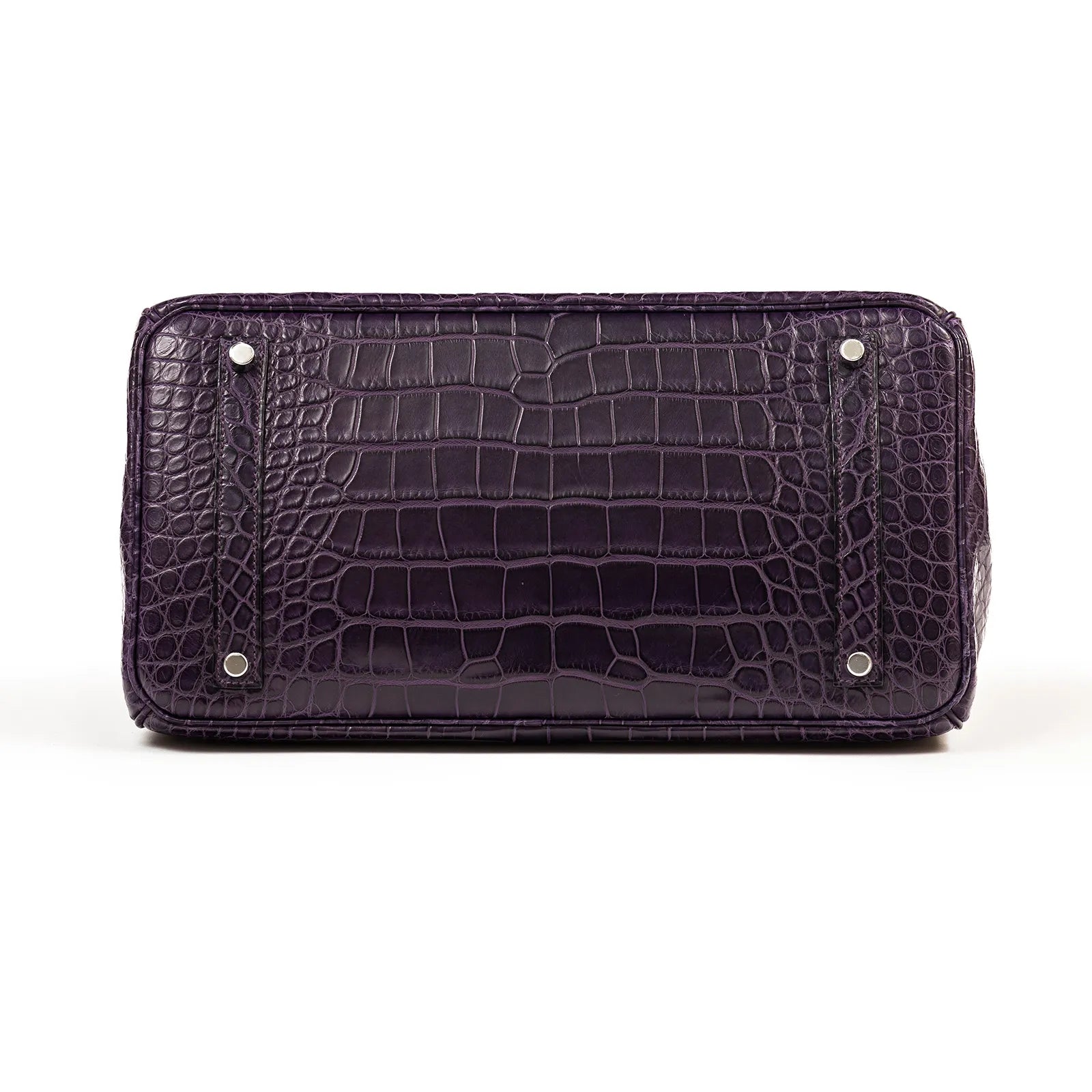 Bottom view of Hermès Birkin 35 Amethyste Matte Alligator showing palladium hardware and textured leather.