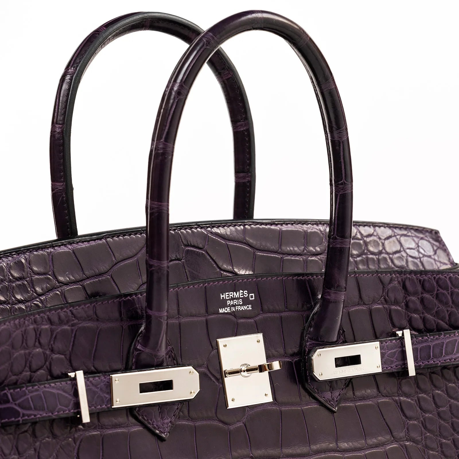 Close-up front view of Hermès Birkin 35 Amethyste Matte Alligator with palladium hardware detail.