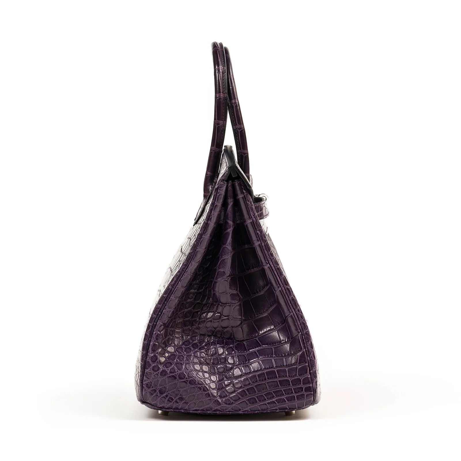 Side view of Hermès Birkin 35 Amethyste Matte Alligator with palladium hardware showing texture and handle.