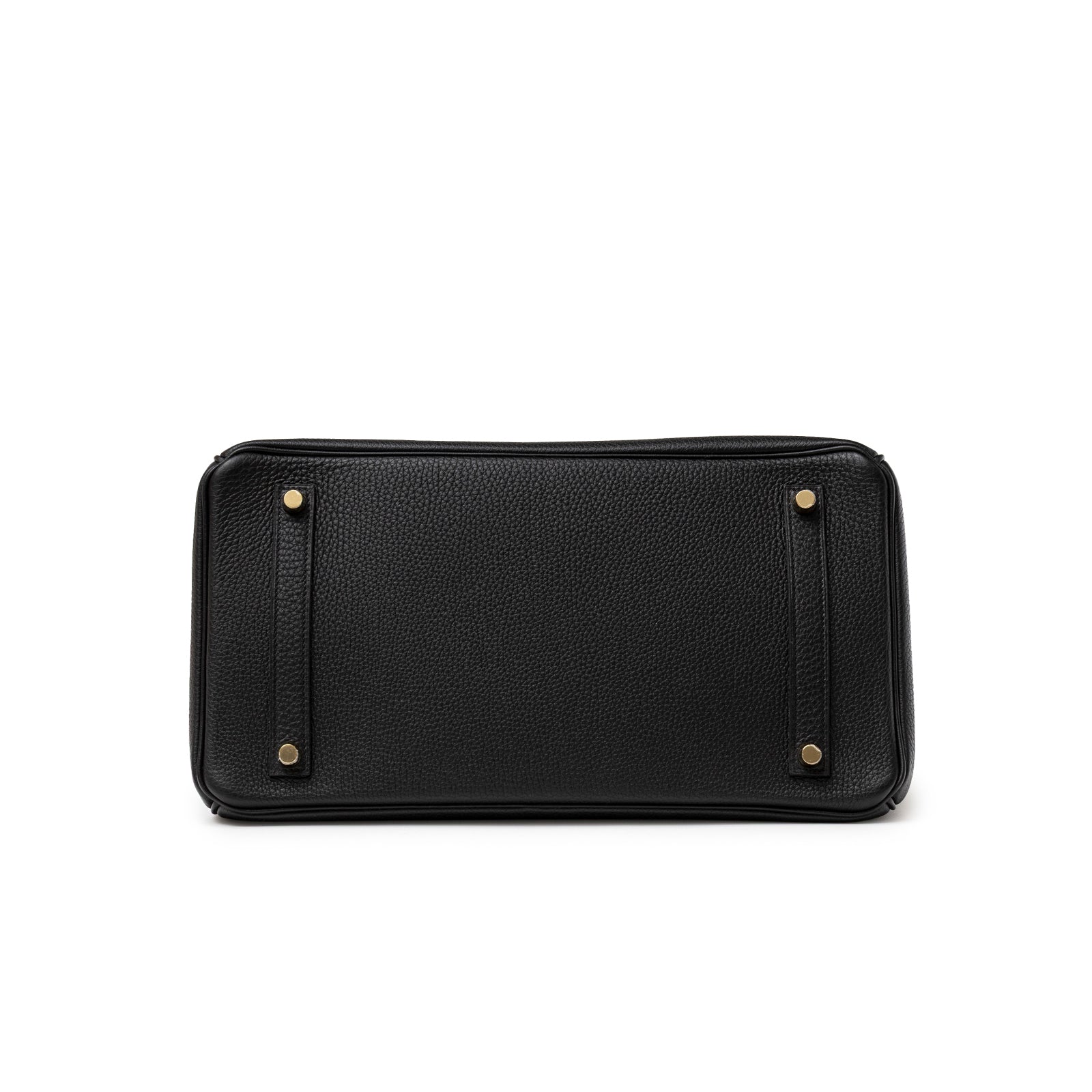 Bottom view of Hermès Birkin 35 Black Togo Gold Hardware showing protective metal feet and textured leather base.