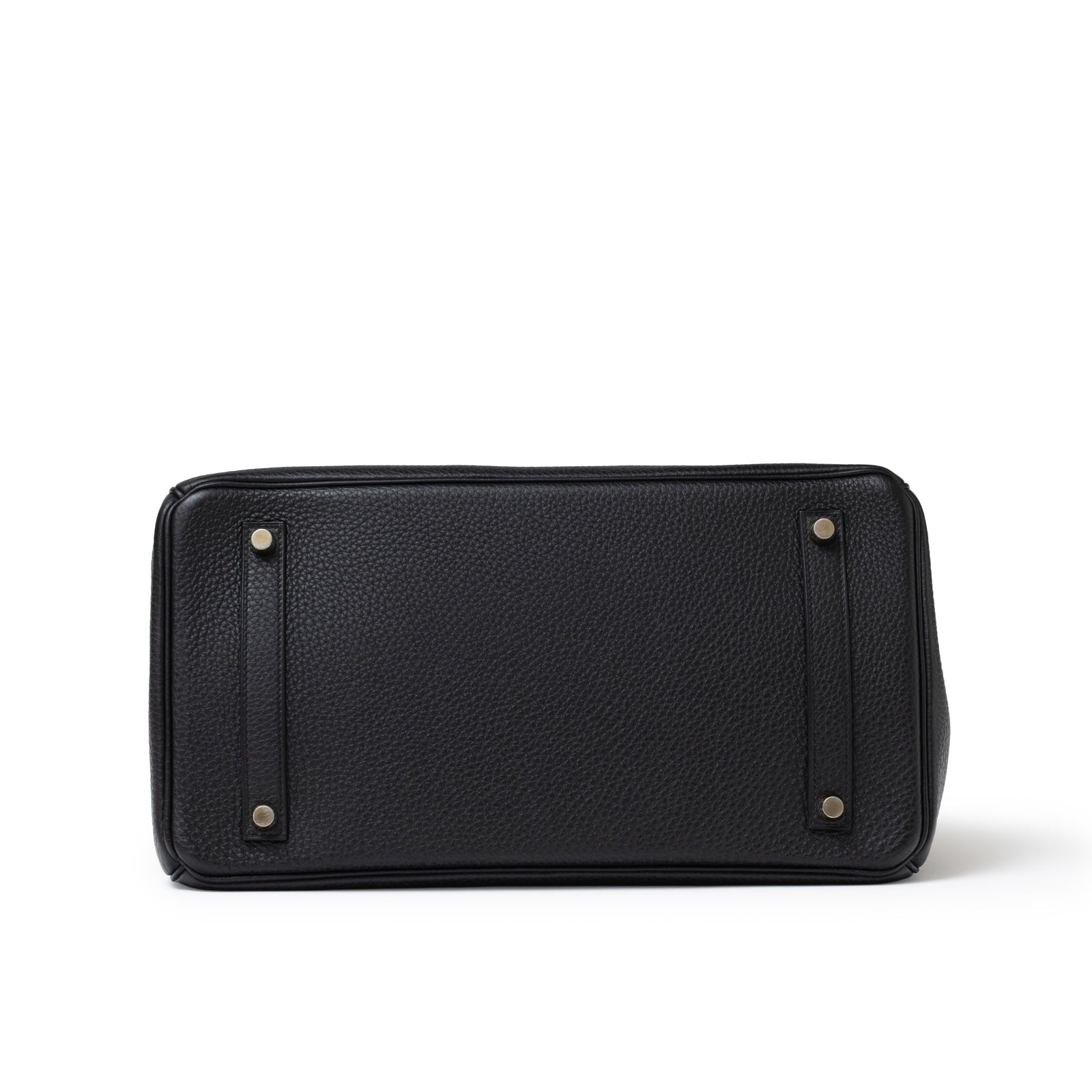 Bottom view of Hermès Birkin 35 Black Togo Gold Hardware showcasing leather texture and protective studs.