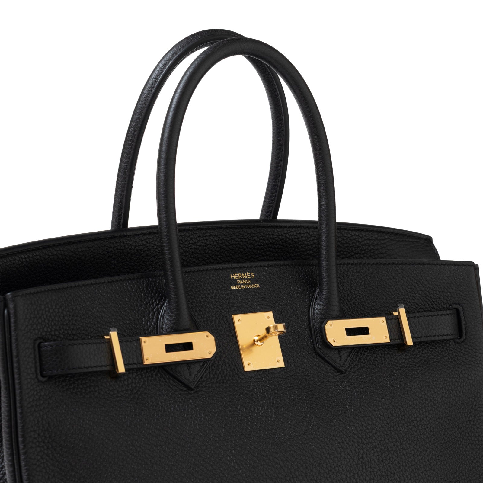 Close-up front view of Hermès Birkin 35 Black Togo Gold Hardware showing lock and leather texture.