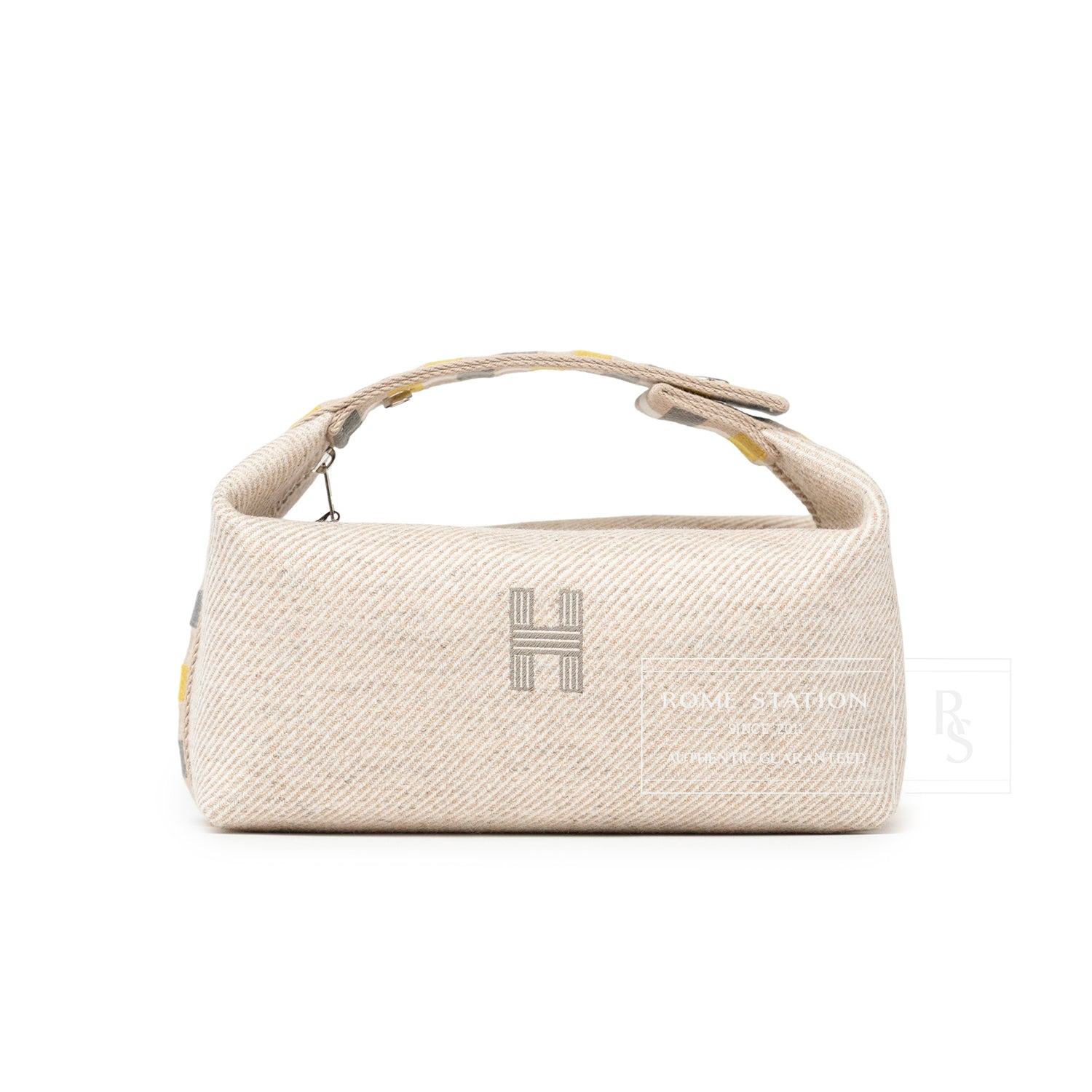 Hermès Bride-a-Brac au Carre Case Small Model Seigle in textured light beige fabric with top handle view