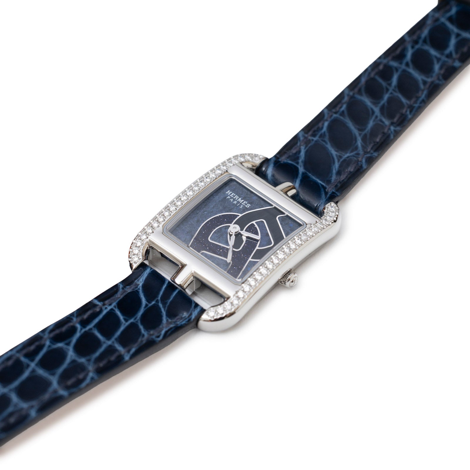 Angled close-up of Hermès Cape Cod Diamond Watch Small Model 31mm Steel with shiny alligator blue Saphir strap