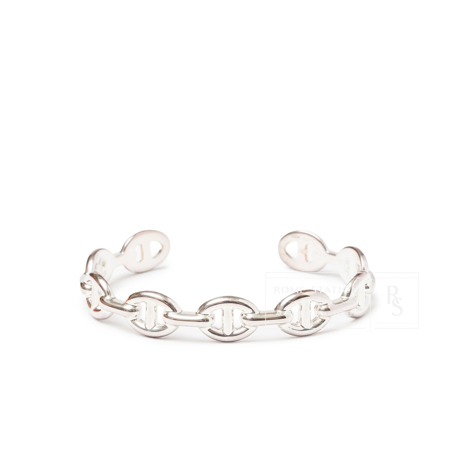 Front angled view of polished Hermès Chaine d'ancre Enchainee Silver Bracelet Medium Model with linked oval chain design