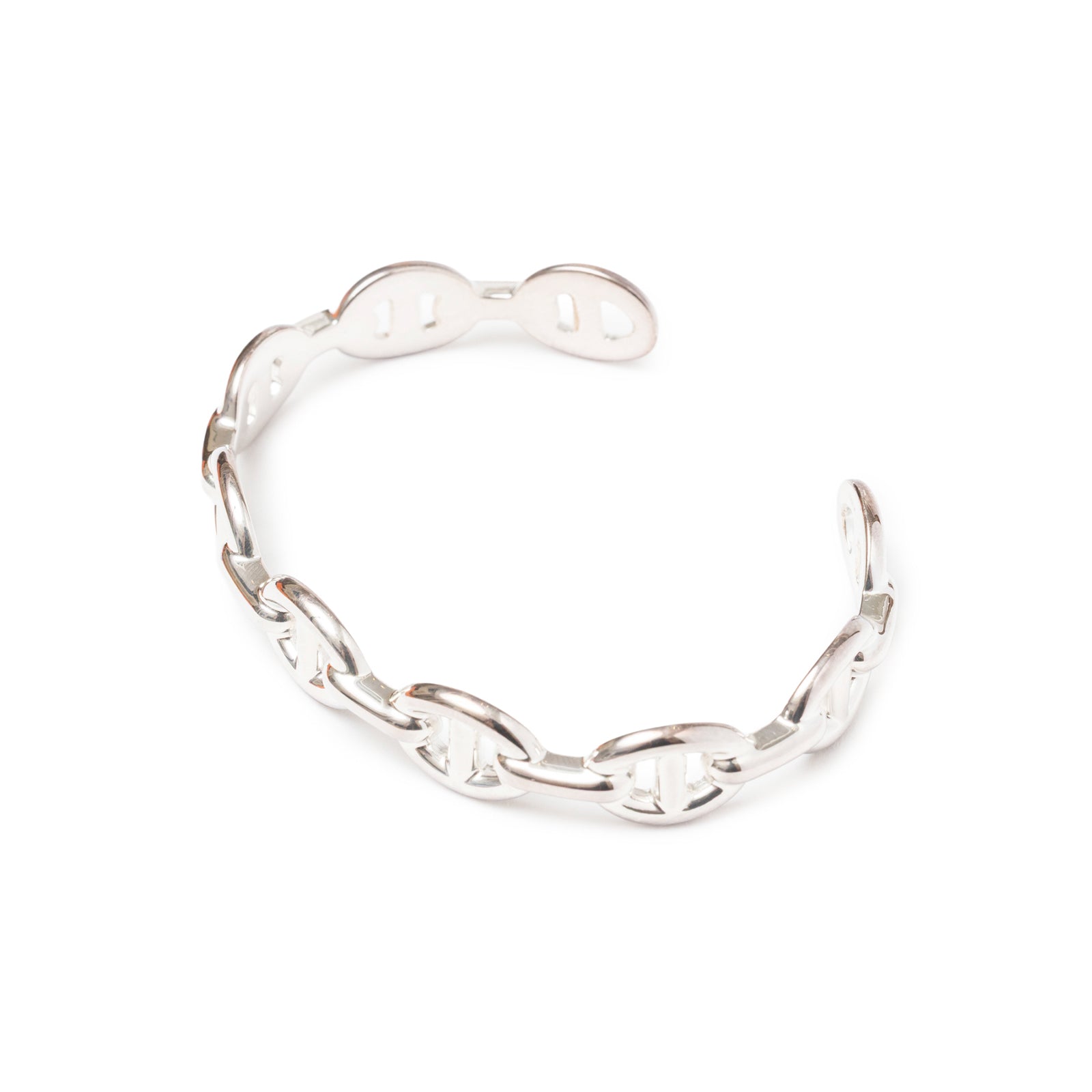 Angled close-up of Hermès Chaine d'ancre Enchainee Silver Bracelet Medium Model showcasing its linked chain design.