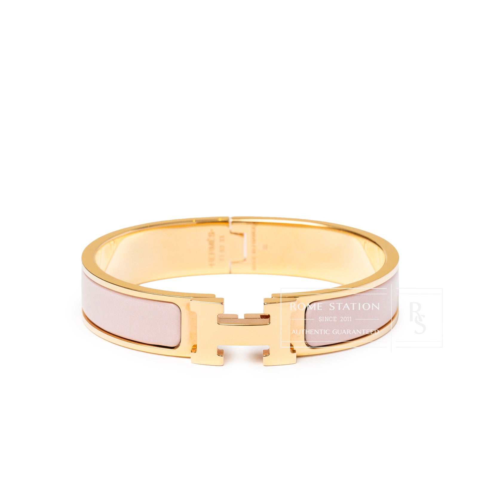 Front view of Hermès Clic H bracelet PM Pink Gold Hardware showing pale pink enamel and iconic H clasp