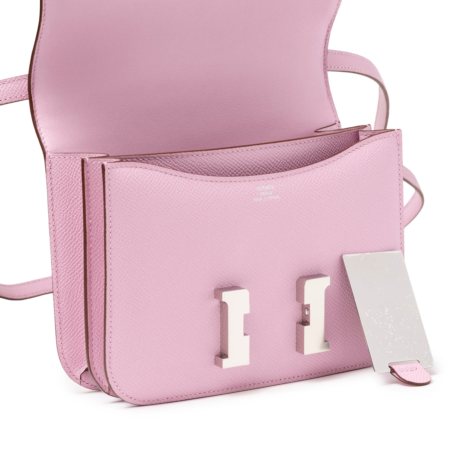 Open view of Hermès Constance 18 Mauve Sylvester Epsom Palladium showing interior compartments and hardware inside flap
