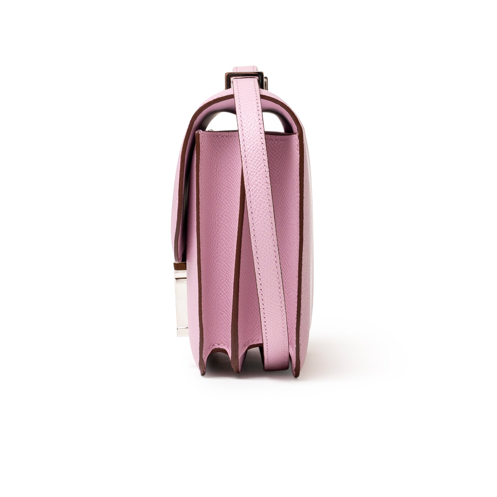 Side profile of Hermès Constance 18 Mauve Sylvester Epsom Palladium showing structured shape and leather strap