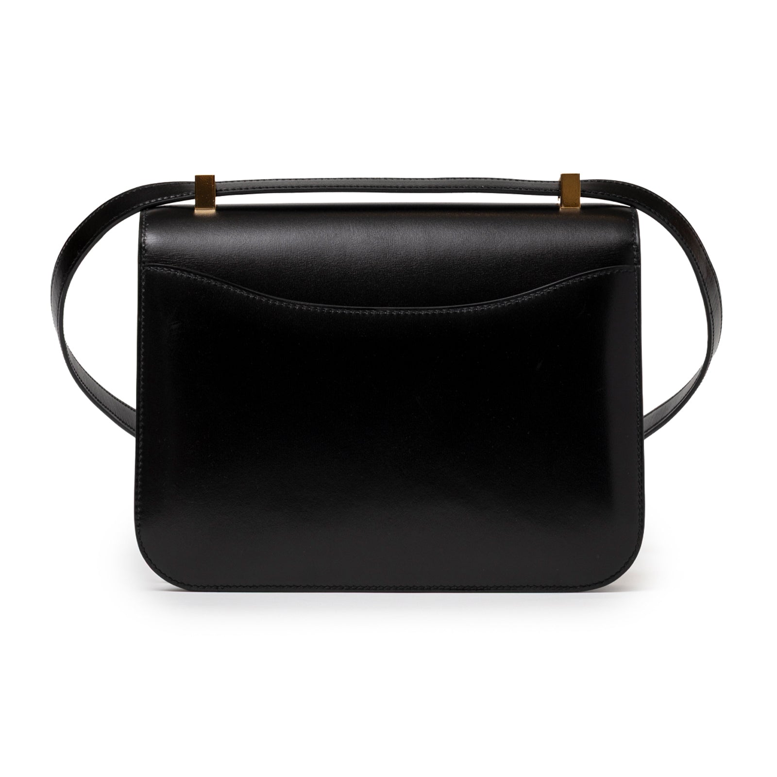 Back view of Hermès Constance 24 Black Box Gold Hardware showing smooth leather and strap detail