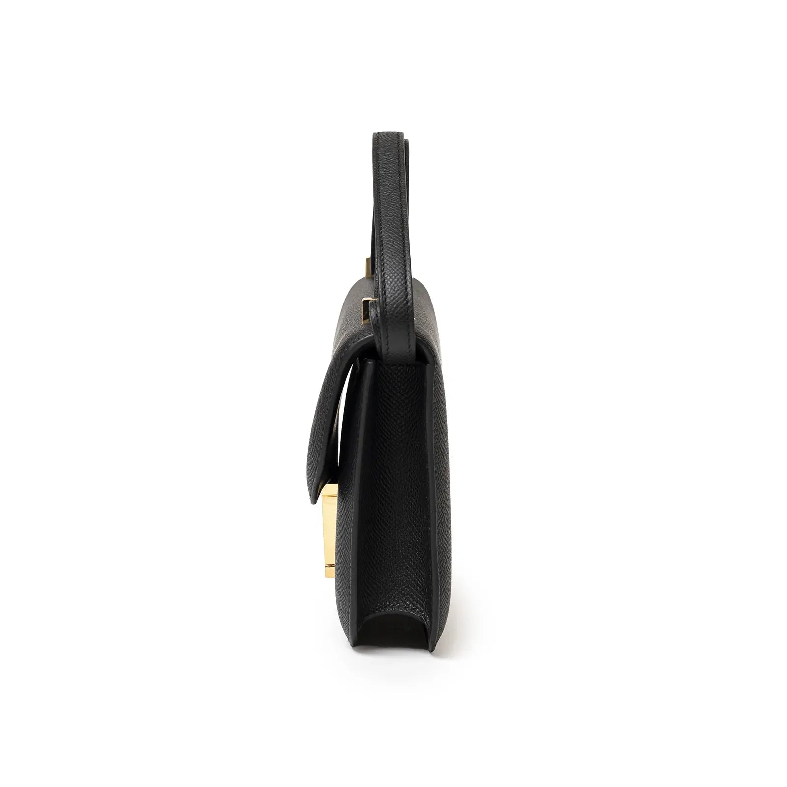 Side profile of Hermès Constance Elan Black Epsom Gold Hardware handbag showing slim silhouette and handle design