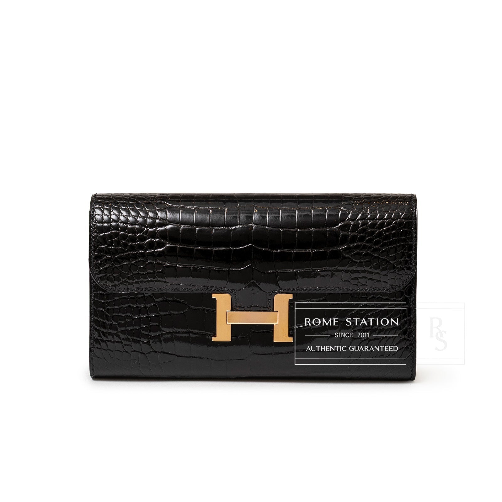 Front view of Hermès Constance Long Wallet Black Shiny Alligator Rose Gold Hardware showing H clasp detail.