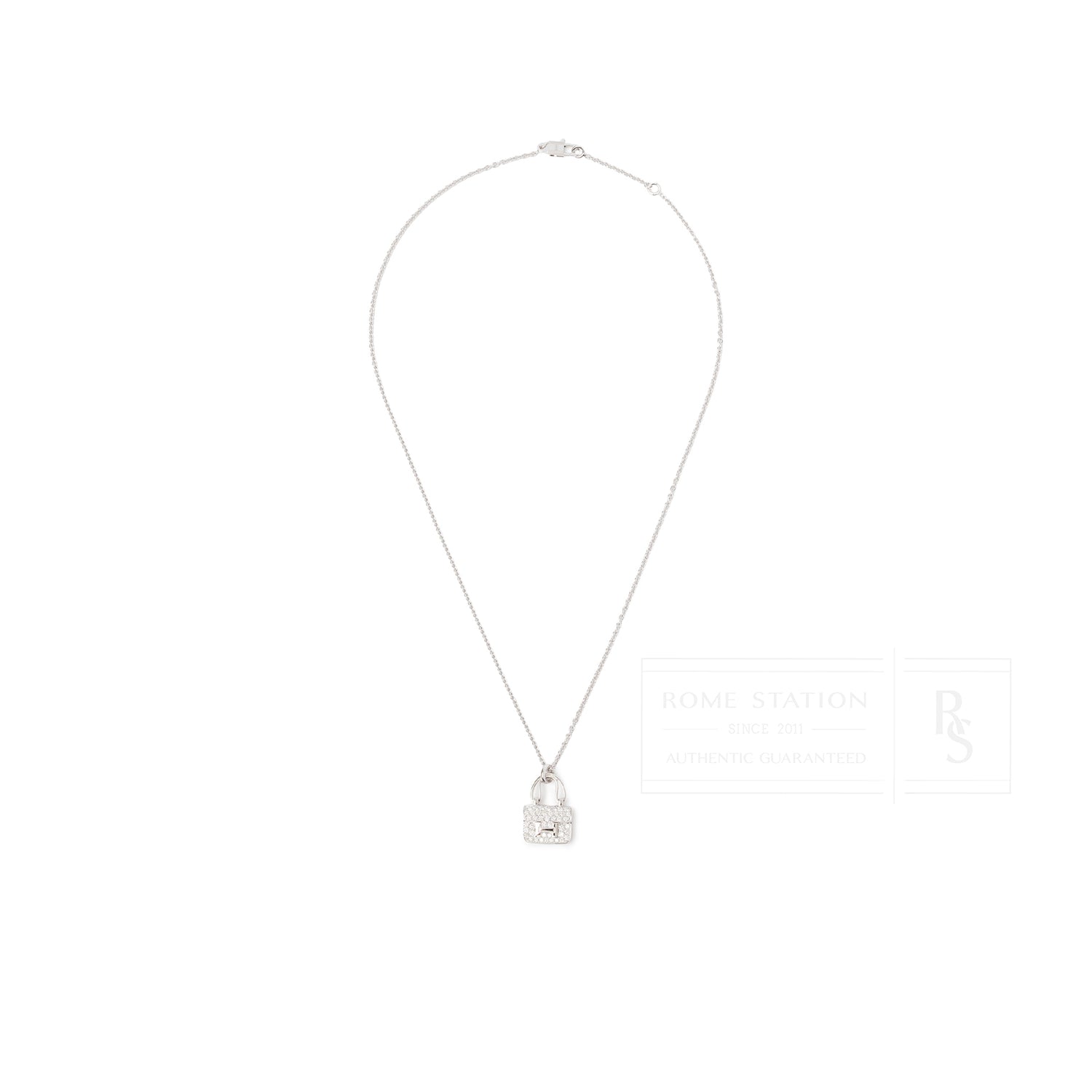 Front view of Hermès Constance Pendant 18K White Gold and Diamonds on delicate chain with clasp closure