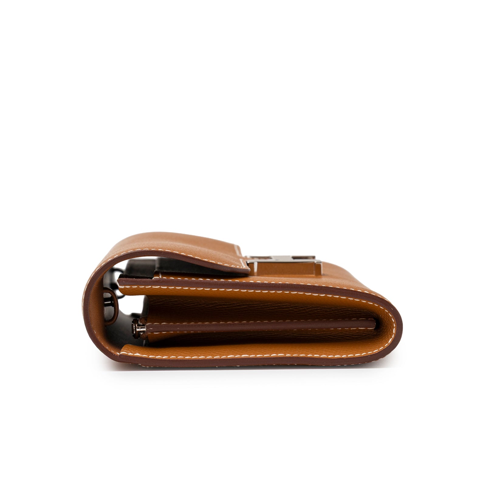 Side profile of Hermès Constance To Go Wallet Gold Epsom Palladium Hardware showing folded smooth leather and clasp edge.