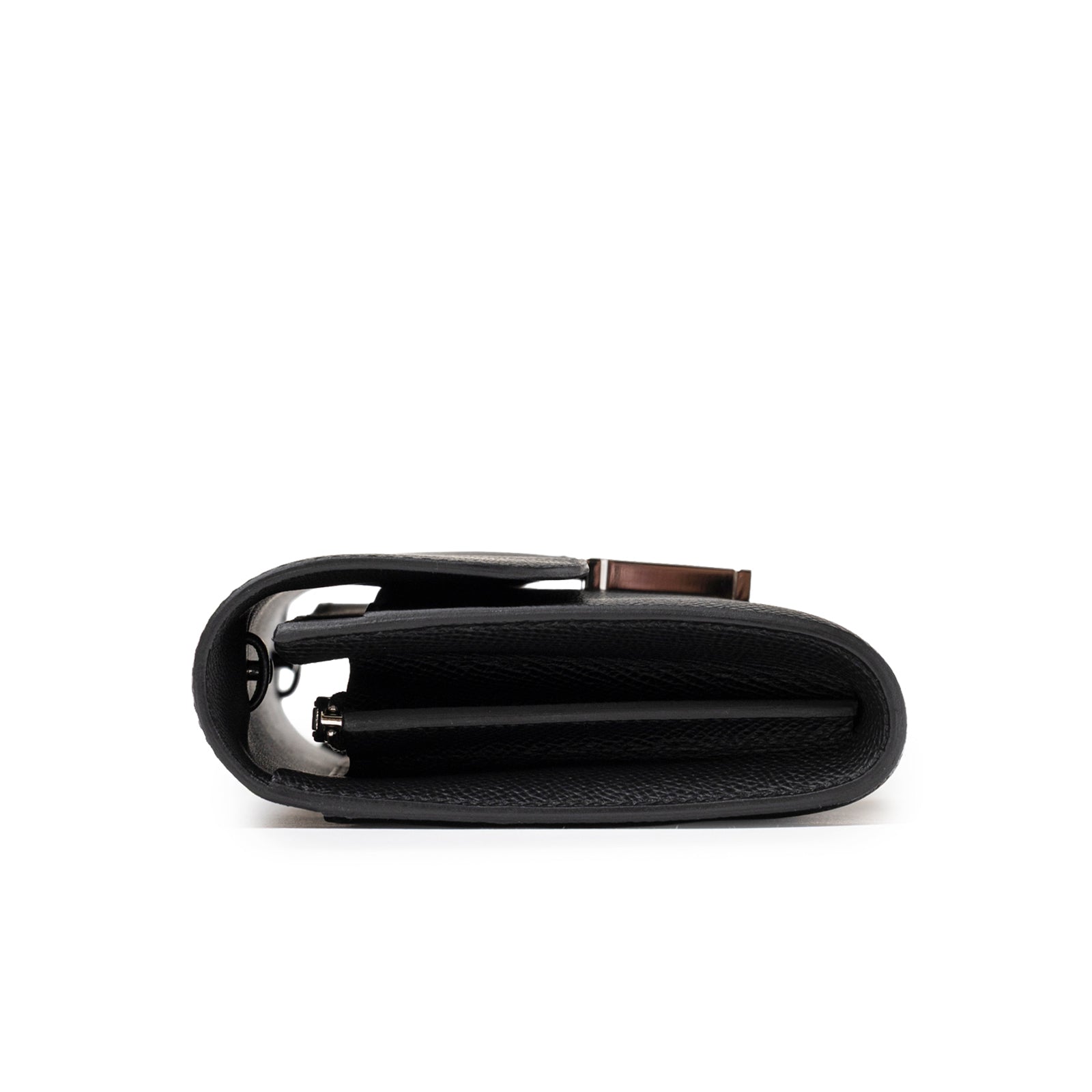 Side profile view of Hermès Constance To Go Wallet Black Epsom Palladium Hardware showing folded leather layers