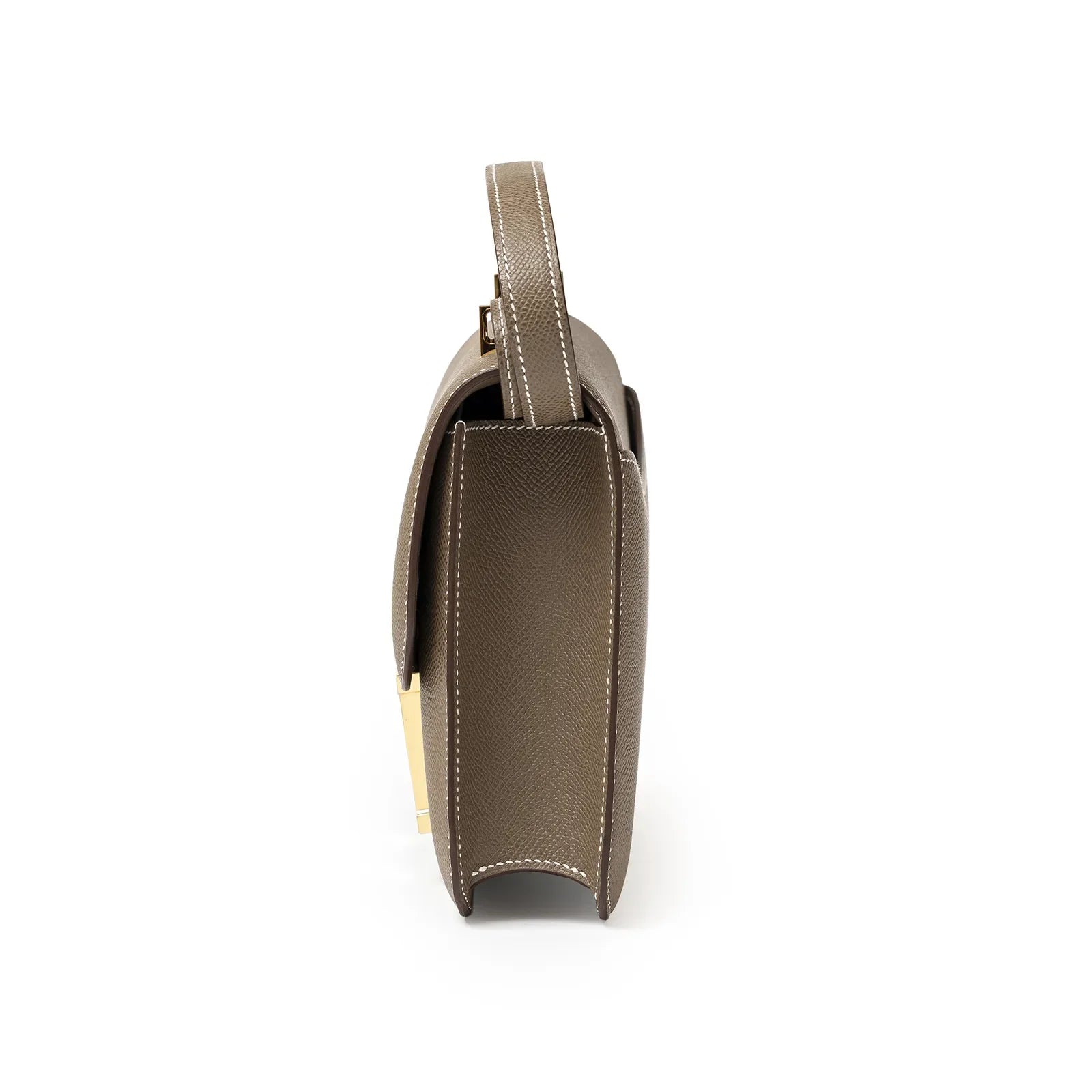 Side view of Hermès Constance 24 Etoupe Epsom Gold Hardware showing structured silhouette and detailed stitching