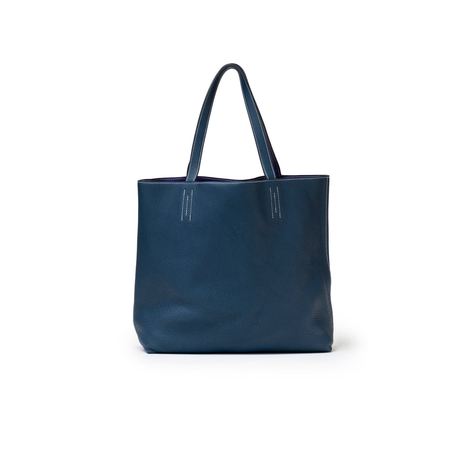 Back view of Hermès Double Sens Reversible Bicolor Shoulder Bag Clemence Violet/Blue in deep blue leather with dual handles
