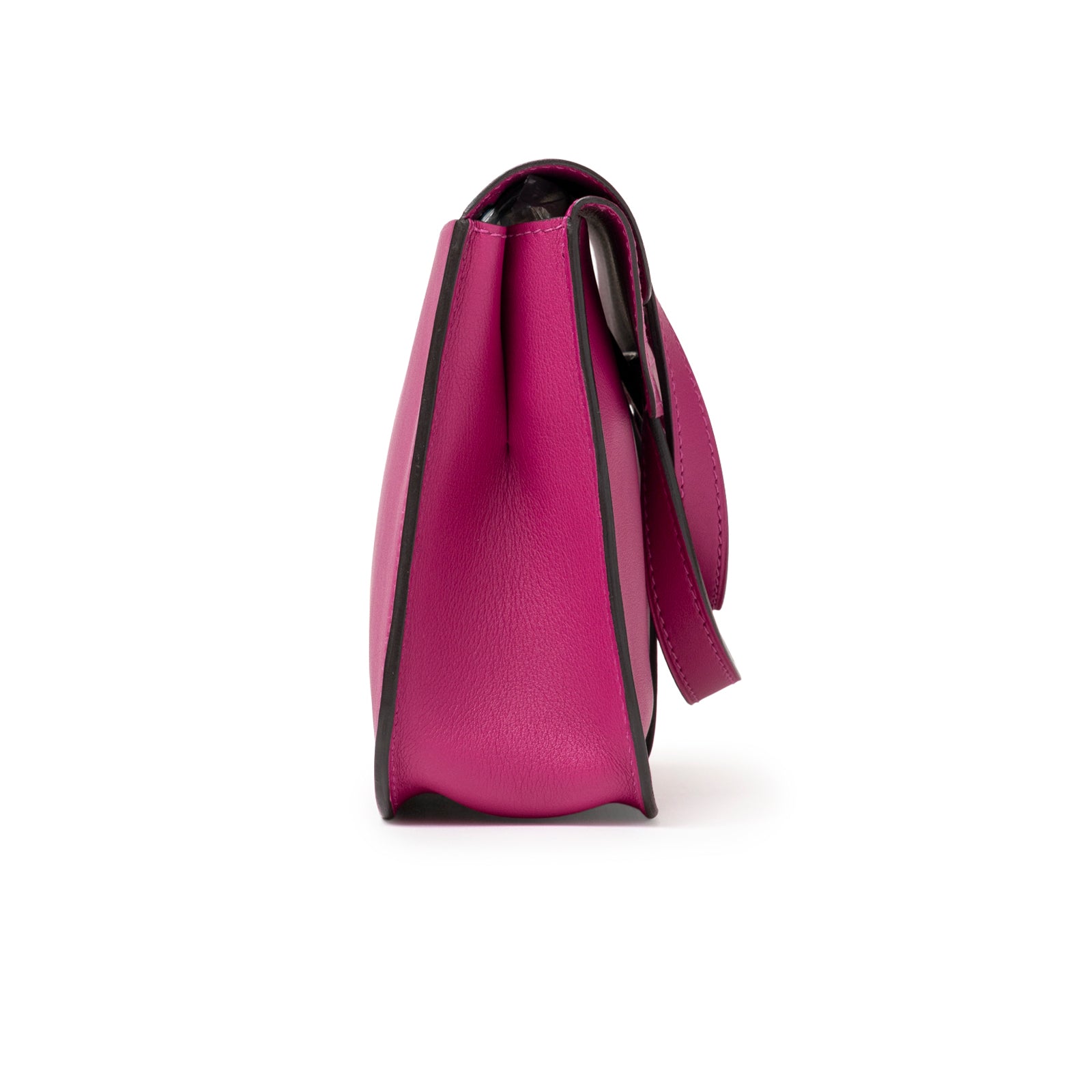 Side view of Hermès Halzan Mini Rose Pourpre Swift Palladium Hardware showing leather grain and structured edges