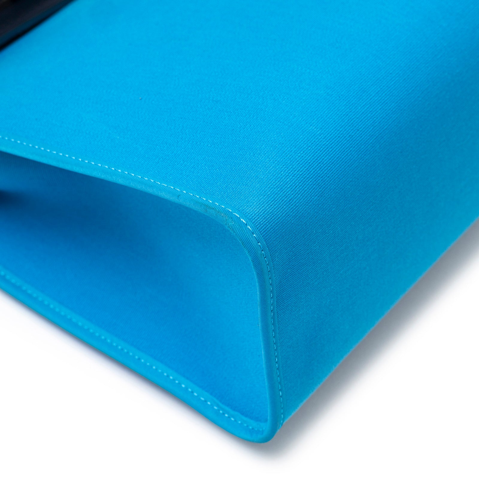 Close-up showing stitching and corner detail of Hermès Herbag Zip PM 31 Blue Vache Hunter Palladium Hardware bag